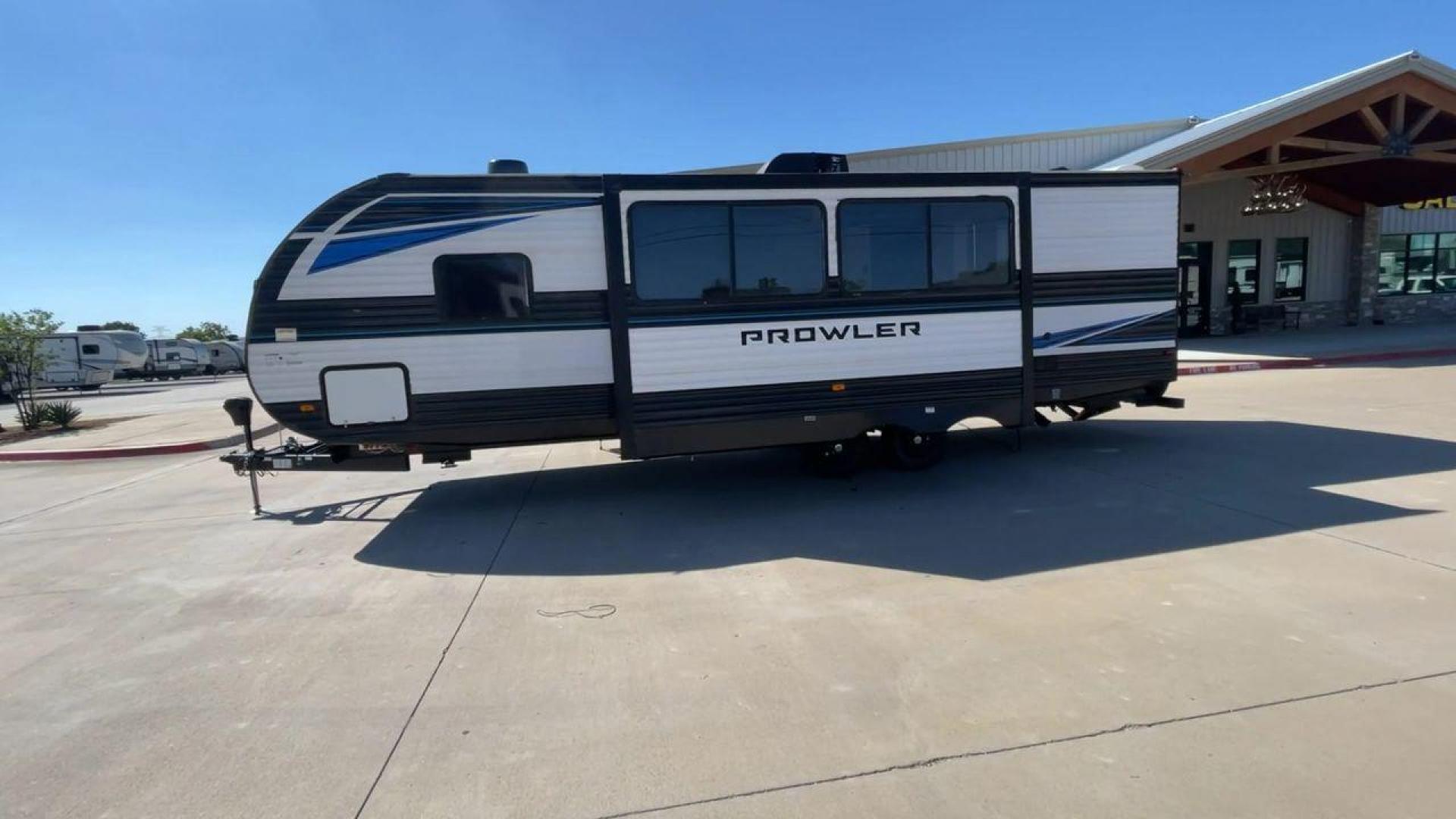 2022 HEARTLAND PROWLER 271BR (5SFPB3228NE) , Length: 31.8 ft. | Dry Weight: 6,570 lbs. | Gross Weight: 7,880 lbs. | Slides: 1 transmission, located at 4319 N Main Street, Cleburne, TX, 76033, (817) 221-0660, 32.435829, -97.384178 - The 2022 Heartland Prowler 271BR is a 31.8-foot travel trailer designed with both comfort and practicality in mind. Weighing in at a dry weight of 6,570 lbs. and a gross weight of 7,880 lbs., it strikes a balance between spaciousness and easy towing. The single slide-out enhances the interior space, - Photo#6