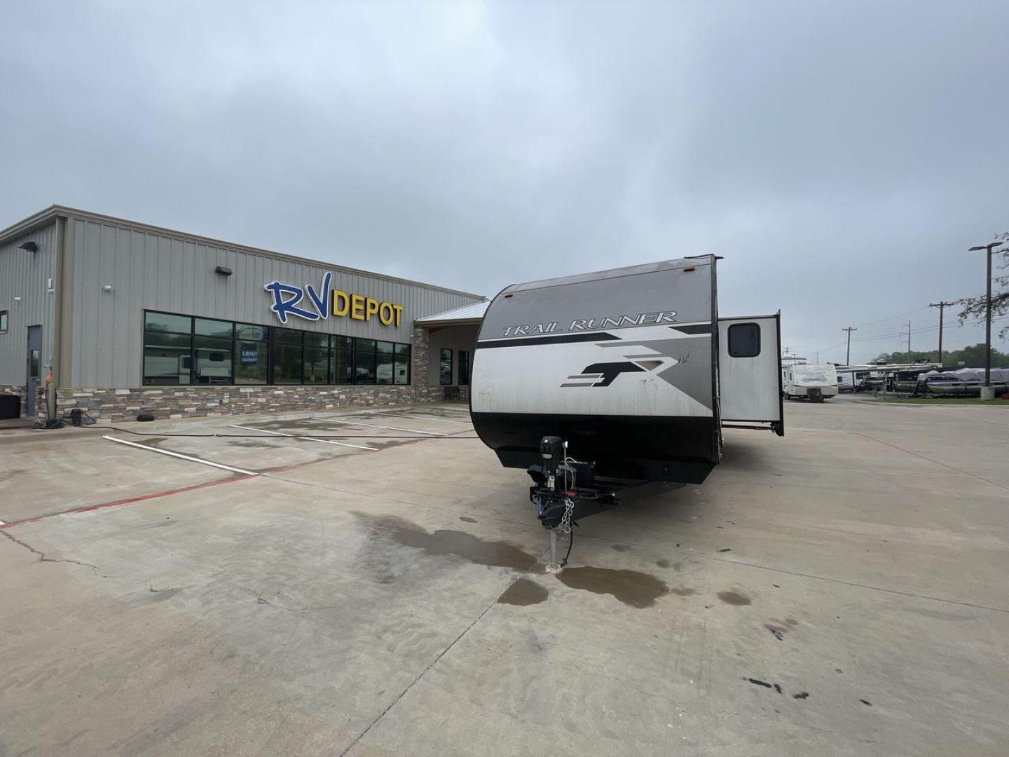 2022 HEARTLAND TRAIL RUNNER 31DB (5SFEB3724NE) , Length: 36.92 ft. | Dry Weight: 7,040 lbs. | Gross Weight: 9,642 lbs. | Slides: 1 transmission, located at 4319 N Main Street, Cleburne, TX, 76033, (817) 221-0660, 32.435829, -97.384178 - The 2022 Heartland Trail Runner 31DB is a flexible, family-friendly travel trailer that will make your camping trip more enjoyable. With a length of 36.92 feet and a dry weight of 7,040 pounds, this trailer gives you plenty of room and comfort for your trips. The gross weight of 9,642 pounds means t - Photo#0