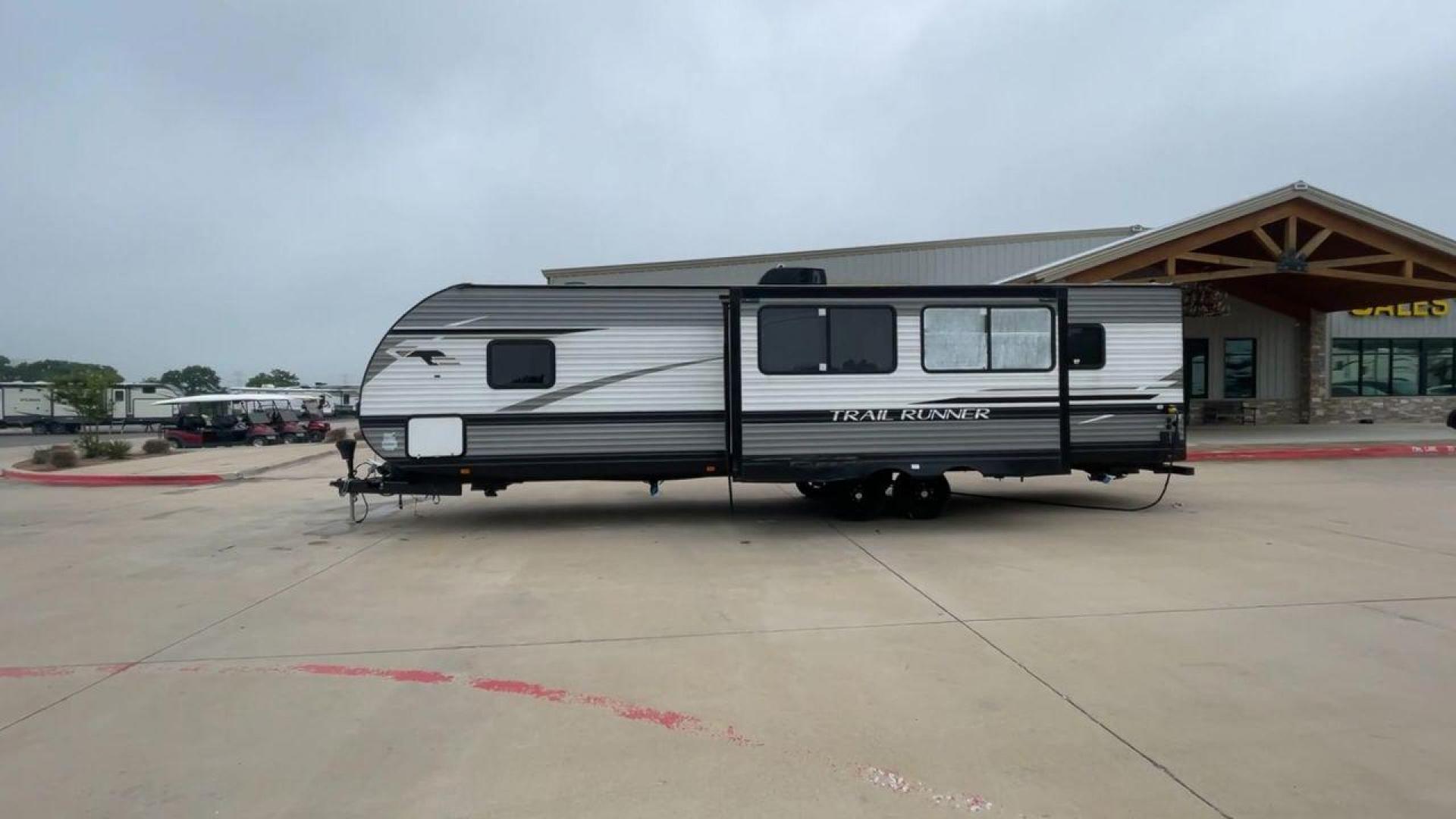 2022 HEARTLAND TRAIL RUNNER 31DB (5SFEB3724NE) , Length: 36.92 ft. | Dry Weight: 7,040 lbs. | Gross Weight: 9,642 lbs. | Slides: 1 transmission, located at 4319 N Main Street, Cleburne, TX, 76033, (817) 221-0660, 32.435829, -97.384178 - The 2022 Heartland Trail Runner 31DB is a flexible, family-friendly travel trailer that will make your camping trip more enjoyable. With a length of 36.92 feet and a dry weight of 7,040 pounds, this trailer gives you plenty of room and comfort for your trips. The gross weight of 9,642 pounds means t - Photo#6