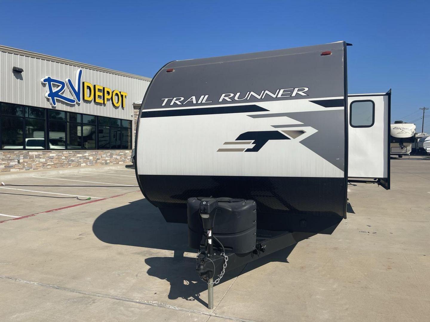 2022 HEARTLAND TRAIL RUNNER 31DB (5SFEB3728NE) , Length: 36.92 ft. | Dry Weight: 7,040 lbs. | Gross Weight: 9,642 lbs. | Slides: 1 transmission, located at 4319 N Main Street, Cleburne, TX, 76033, (817) 221-0660, 32.435829, -97.384178 - The 2022 Heartland Trail Runner 31DB is a flexible, family-friendly travel trailer that will make your camping trip more enjoyable. With a length of 36.92 feet and a dry weight of 7,040 pounds, this trailer gives you plenty of room and comfort for your trips. The gross weight of 9,642 pounds means t - Photo#0