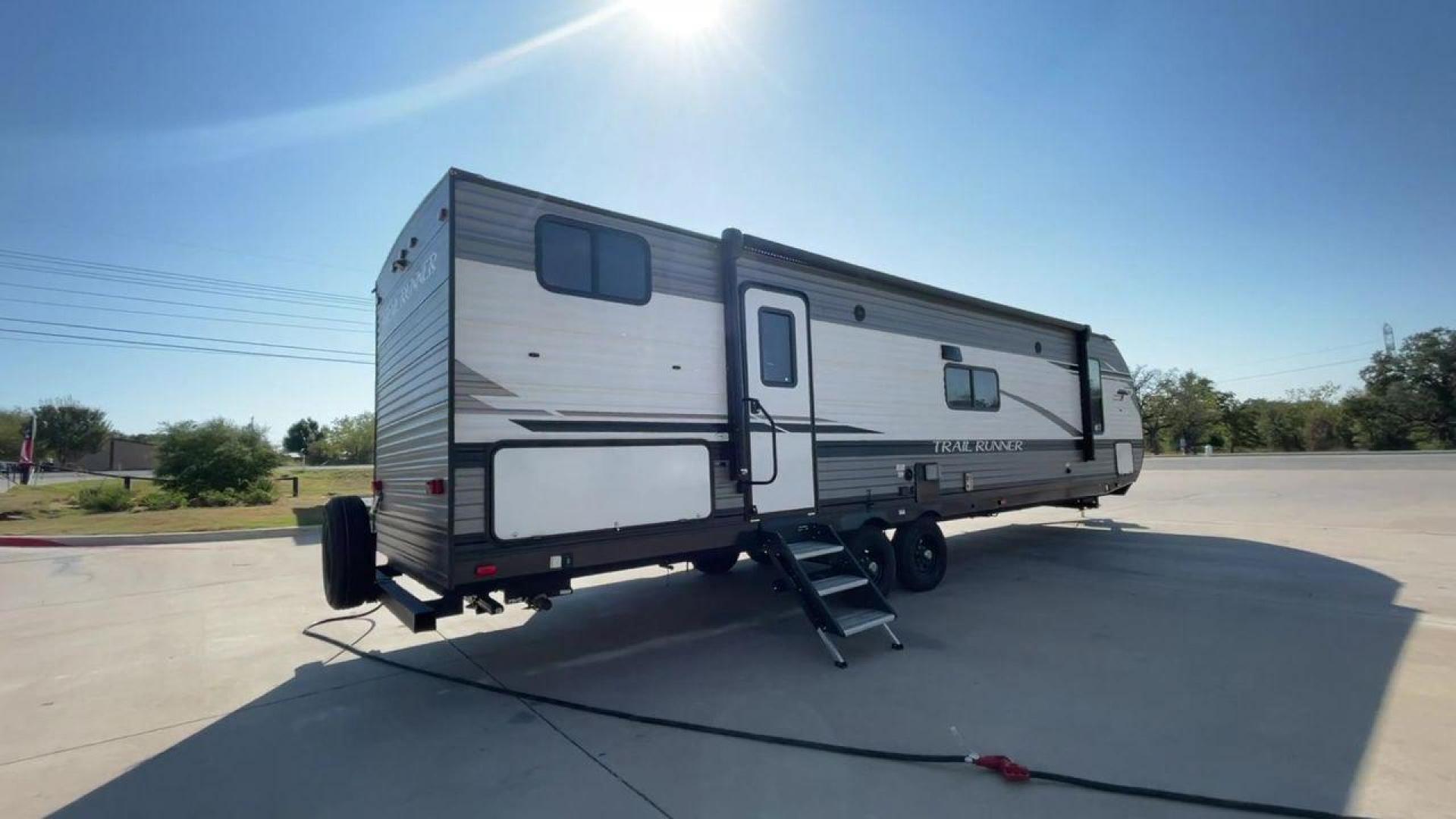 2022 HEARTLAND TRAIL RUNNER 31DB (5SFEB3728NE) , Length: 36.92 ft. | Dry Weight: 7,040 lbs. | Gross Weight: 9,642 lbs. | Slides: 1 transmission, located at 4319 N Main Street, Cleburne, TX, 76033, (817) 221-0660, 32.435829, -97.384178 - The 2022 Heartland Trail Runner 31DB is a flexible, family-friendly travel trailer that will make your camping trip more enjoyable. With a length of 36.92 feet and a dry weight of 7,040 pounds, this trailer gives you plenty of room and comfort for your trips. The gross weight of 9,642 pounds means t - Photo#1