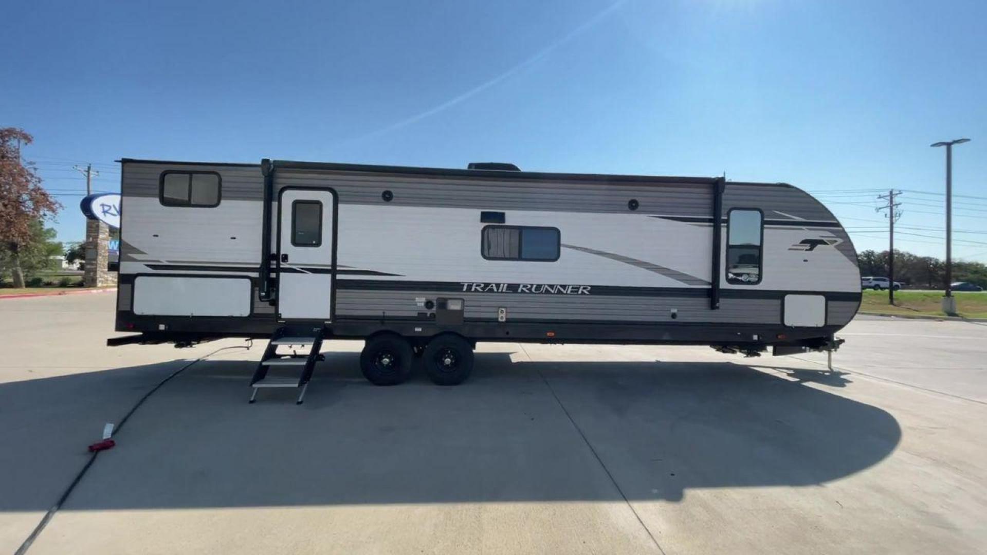 2022 HEARTLAND TRAIL RUNNER 31DB (5SFEB3728NE) , Length: 36.92 ft. | Dry Weight: 7,040 lbs. | Gross Weight: 9,642 lbs. | Slides: 1 transmission, located at 4319 N Main Street, Cleburne, TX, 76033, (817) 221-0660, 32.435829, -97.384178 - The 2022 Heartland Trail Runner 31DB is a flexible, family-friendly travel trailer that will make your camping trip more enjoyable. With a length of 36.92 feet and a dry weight of 7,040 pounds, this trailer gives you plenty of room and comfort for your trips. The gross weight of 9,642 pounds means t - Photo#2