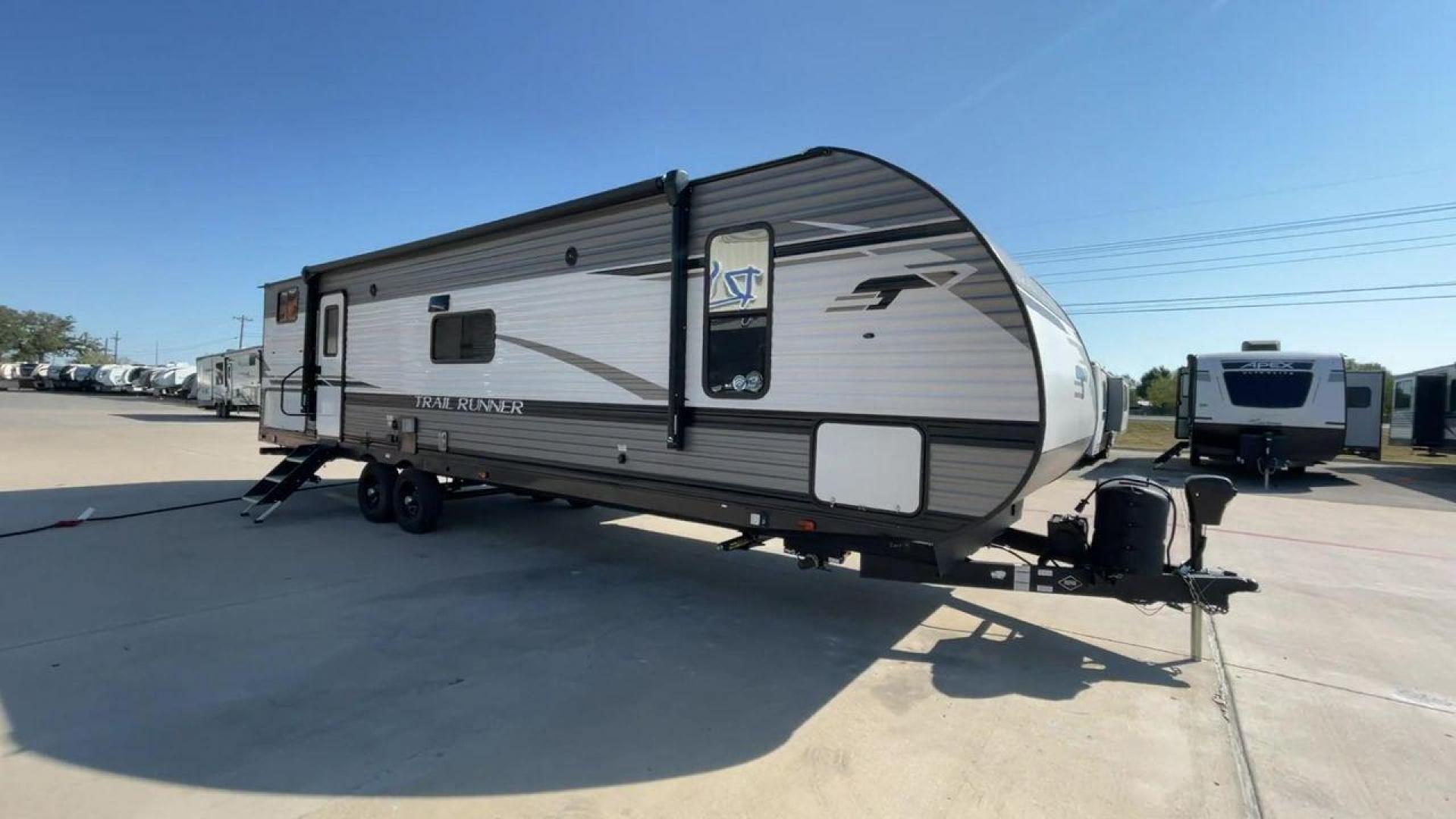 2022 HEARTLAND TRAIL RUNNER 31DB (5SFEB3728NE) , Length: 36.92 ft. | Dry Weight: 7,040 lbs. | Gross Weight: 9,642 lbs. | Slides: 1 transmission, located at 4319 N Main Street, Cleburne, TX, 76033, (817) 221-0660, 32.435829, -97.384178 - The 2022 Heartland Trail Runner 31DB is a flexible, family-friendly travel trailer that will make your camping trip more enjoyable. With a length of 36.92 feet and a dry weight of 7,040 pounds, this trailer gives you plenty of room and comfort for your trips. The gross weight of 9,642 pounds means t - Photo#3