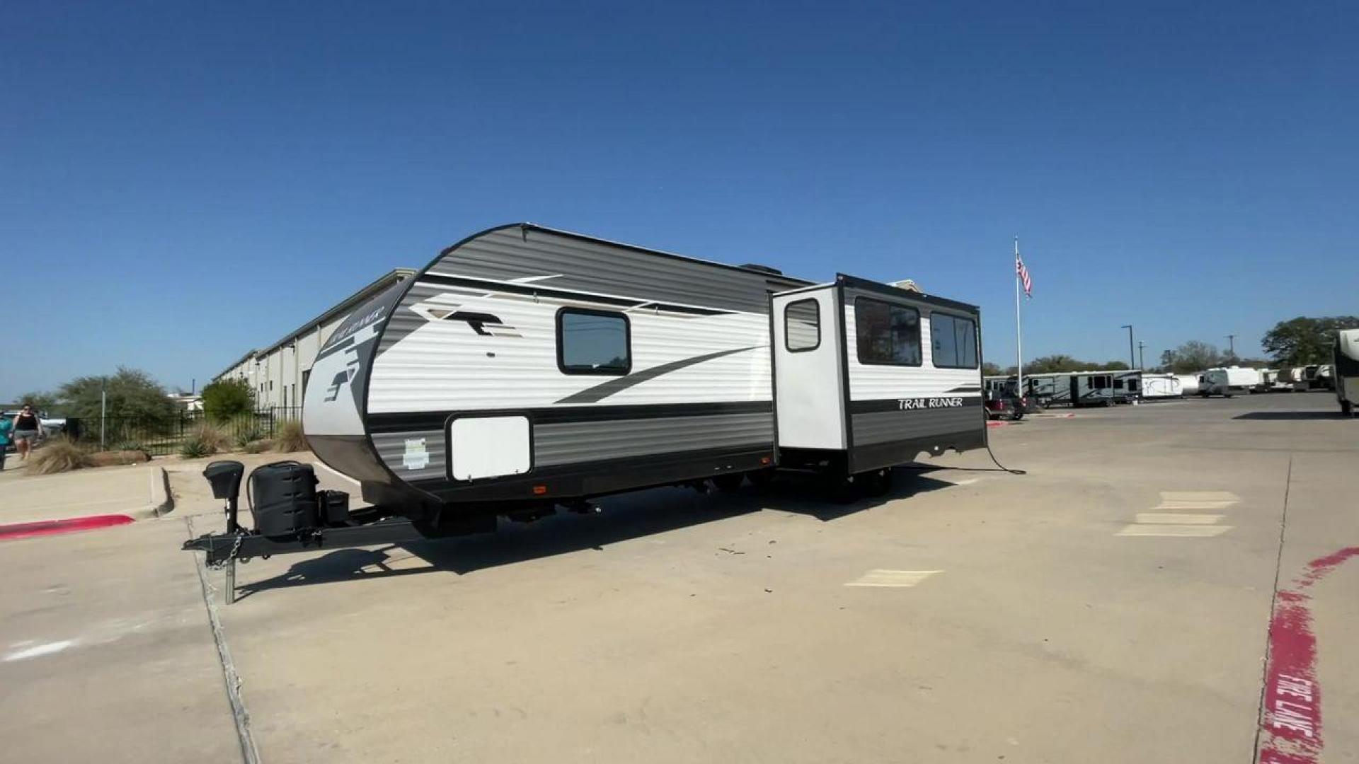 2022 HEARTLAND TRAIL RUNNER 31DB (5SFEB3728NE) , Length: 36.92 ft. | Dry Weight: 7,040 lbs. | Gross Weight: 9,642 lbs. | Slides: 1 transmission, located at 4319 N Main Street, Cleburne, TX, 76033, (817) 221-0660, 32.435829, -97.384178 - The 2022 Heartland Trail Runner 31DB is a flexible, family-friendly travel trailer that will make your camping trip more enjoyable. With a length of 36.92 feet and a dry weight of 7,040 pounds, this trailer gives you plenty of room and comfort for your trips. The gross weight of 9,642 pounds means t - Photo#5