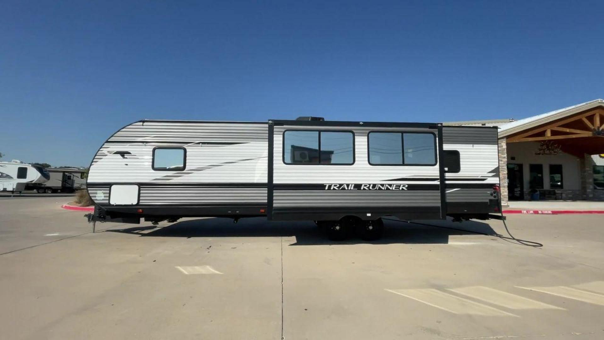 2022 HEARTLAND TRAIL RUNNER 31DB (5SFEB3728NE) , Length: 36.92 ft. | Dry Weight: 7,040 lbs. | Gross Weight: 9,642 lbs. | Slides: 1 transmission, located at 4319 N Main Street, Cleburne, TX, 76033, (817) 221-0660, 32.435829, -97.384178 - The 2022 Heartland Trail Runner 31DB is a flexible, family-friendly travel trailer that will make your camping trip more enjoyable. With a length of 36.92 feet and a dry weight of 7,040 pounds, this trailer gives you plenty of room and comfort for your trips. The gross weight of 9,642 pounds means t - Photo#6