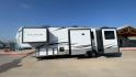 2022 KEYSTONE AVALANCHE 338GK (4YDFAVS24NE) , Length: 38 ft | Dry Weight: 12,523 lbs | Gross Weight: 15,500 lbs | Slides: 4 transmission, located at 4319 N Main Street, Cleburne, TX, 76033, (817) 221-0660, 32.435829, -97.384178 - The 2022 Keystone Avalanche 338GK showcases a sleek and modern exterior design, built for durability and style. This fifth wheel features a glossy white body accented by sharp, aerodynamic lines in subtle shades of gray and black, giving it a clean and contemporary look. The front cap is bold and ae - Photo#6