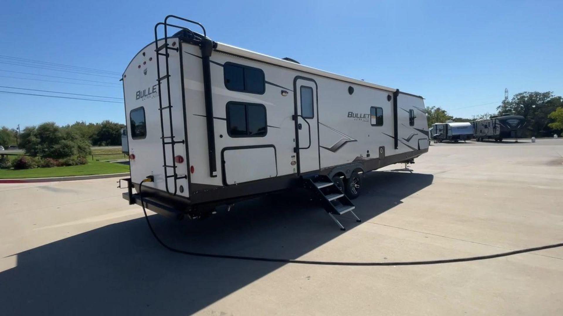 2022 KEYSTONE BULLET 331BHS (4YDTBLR2XNT) , Length: 37.5 ft. | Dry Weight: 6,898 lbs. | Gross Weight: 9,200 lbs. | Slides: 2 transmission, located at 4319 N Main Street, Cleburne, TX, 76033, (817) 221-0660, 32.435829, -97.384178 - Measuring at an impressive length of 37.5 feet, the Bullet 331BHS provides ample space for relaxation and entertainment. Despite its generous size, it maintains a manageable dry weight of 6,898 lbs., making it towable by a wide range of vehicles. With a gross weight of 9,200 lbs. and two slide-outs, - Photo#1