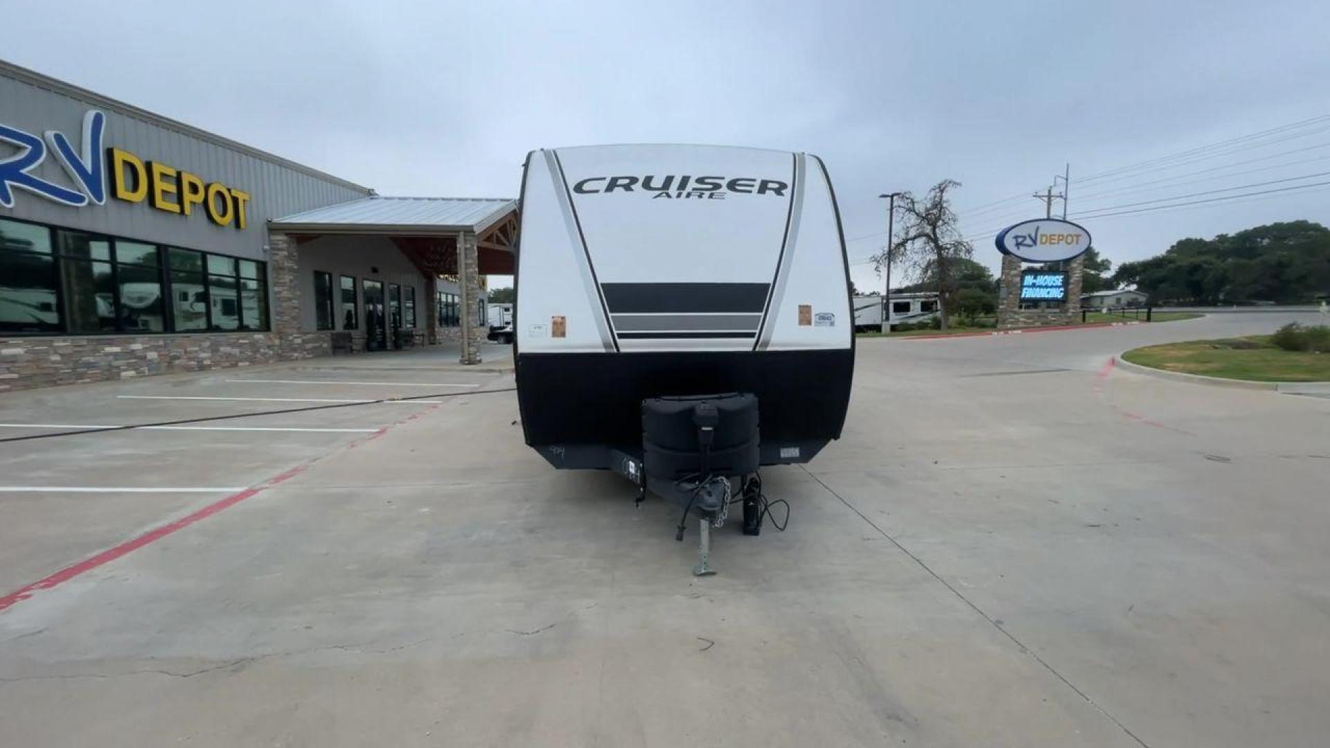 2022 KEYSTONE CRUISER 33BHB (4YDTCRS28N6) , Length: 37.83 ft. | Dry Weight: 7,832 lbs. | Slides: 2 transmission, located at 4319 N Main Street, Cleburne, TX, 76033, (817) 221-0660, 32.435829, -97.384178 - The 2022 Keystone Cruiser 33BHB has a sleek, modern exterior design. The front showcases a rounded, aerodynamic front cap with the Cruiser Aire branding prominently displayed. The body of the RV is predominantly white, accented with stylish black and gray graphic designs that add a sharp, streamline - Photo#4