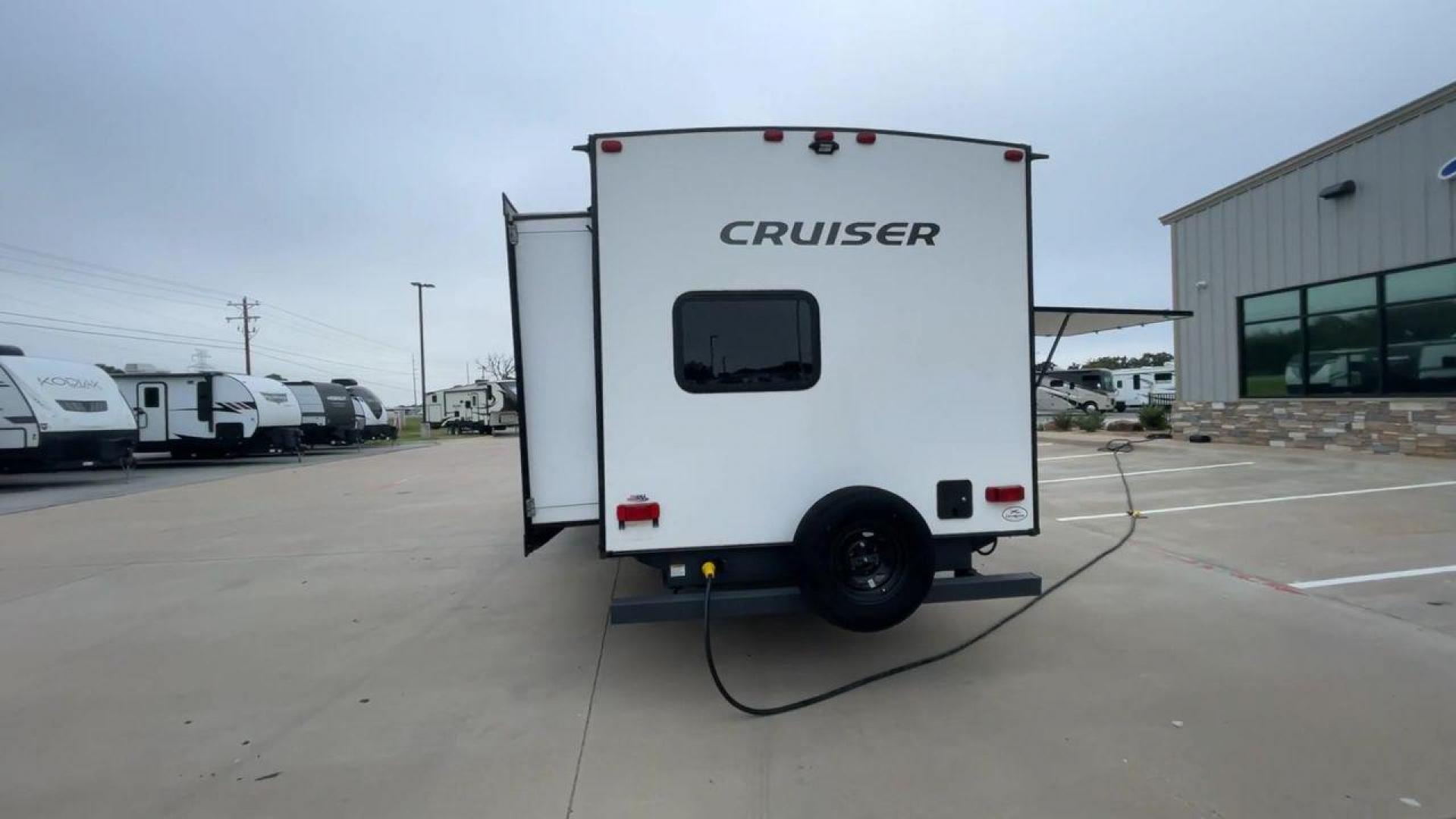 2022 KEYSTONE CRUISER 33BHB (4YDTCRS28N6) , Length: 37.83 ft. | Dry Weight: 7,832 lbs. | Slides: 2 transmission, located at 4319 N Main Street, Cleburne, TX, 76033, (817) 221-0660, 32.435829, -97.384178 - The 2022 Keystone Cruiser 33BHB has a sleek, modern exterior design. The front showcases a rounded, aerodynamic front cap with the Cruiser Aire branding prominently displayed. The body of the RV is predominantly white, accented with stylish black and gray graphic designs that add a sharp, streamline - Photo#8