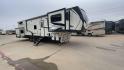 2022 KEYSTONE MONTANA 377FL (4YDFHMU26NA) , Length: 41.92 ft | Dry Weight: 13,267 lbs | Gross Weight: 16,460 lbs | Slides: 4 transmission, located at 4319 N Main Street, Cleburne, TX, 76033, (817) 221-0660, 32.435829, -97.384178 - The 2022 Keystone Montana 377FL is a luxury fifth wheel that offers an upscale design and a front-living floor plan, ideal for extended travel or full-time living. Its body features a clean white base color with bold black and gray graphics, creating a sleek and contemporary look. With its sophistic - Photo#3