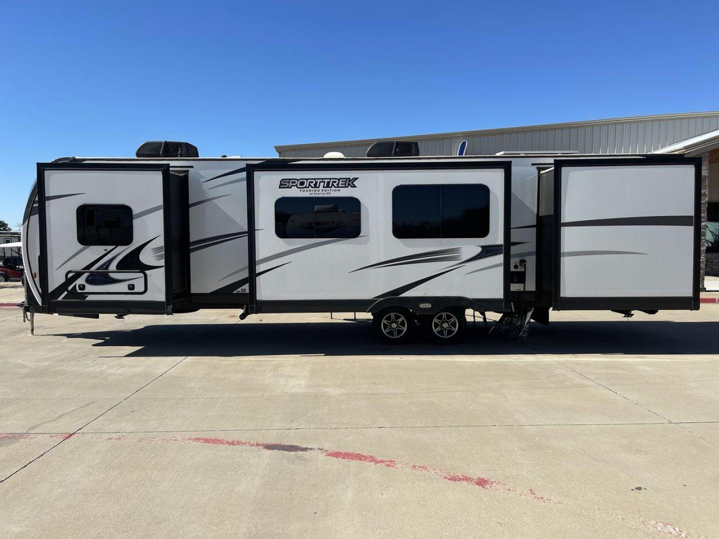 2022 KZ SPORT TREK 343VBH (4EZT13423N8) , Length: 37.67 ft. | Dry Weight: 8,820 lbs. | Slides: 3 transmission, located at 4319 N Main Street, Cleburne, TX, 76033, (817) 221-0660, 32.435829, -97.384178 - The 2022 Venture RV Sport Trek 343VBH showcases a sleek and modern exterior with a bright white finish and stylish graphics. It stretches an impressive 37.67 feet. This unit is equipped with a power tongue jack and propane tanks at the front for easy hitching and extended camping capabilities. The s - Photo#23