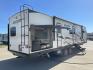 2022 KZ SPORT TREK 343VBH (4EZT13423N8) , Length: 37.67 ft. | Dry Weight: 8,820 lbs. | Slides: 3 transmission, located at 4319 N Main Street, Cleburne, TX, 76033, (817) 221-0660, 32.435829, -97.384178 - The 2022 Venture RV Sport Trek 343VBH showcases a sleek and modern exterior with a bright white finish and stylish graphics. It stretches an impressive 37.67 feet. This unit is equipped with a power tongue jack and propane tanks at the front for easy hitching and extended camping capabilities. The s - Photo#24