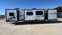 2022 KZ SPORT TREK 343VBH (4EZT13423N8) , Length: 37.67 ft. | Dry Weight: 8,820 lbs. | Slides: 3 transmission, located at 4319 N Main Street, Cleburne, TX, 76033, (817) 221-0660, 32.435829, -97.384178 - The 2022 Venture RV Sport Trek 343VBH showcases a sleek and modern exterior with a bright white finish and stylish graphics. It stretches an impressive 37.67 feet. This unit is equipped with a power tongue jack and propane tanks at the front for easy hitching and extended camping capabilities. The s - Photo#6