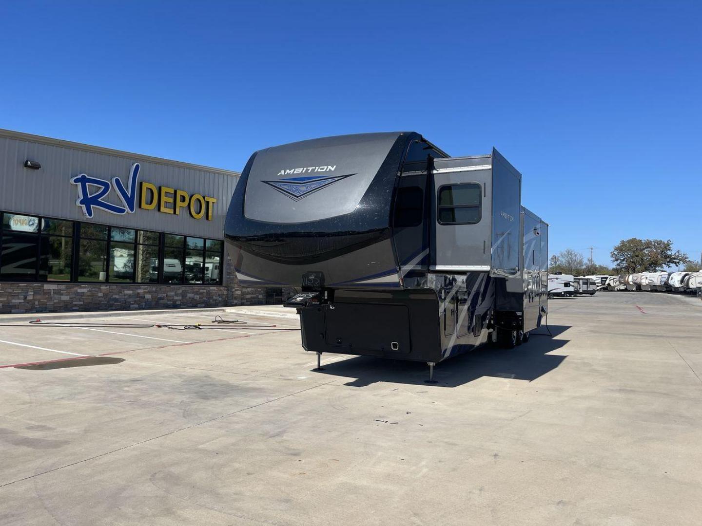 2022 VANLEIGH AMBITION 399TH (7HHAC4333NV) , Length: 43.58 ft. | Dry Weight: 16,900 lbs. | Gross Weight: 21,000 lbs. | Slides: 2 transmission, located at 4319 N Main Street, Cleburne, TX, 76033, (817) 221-0660, 32.435829, -97.384178 - Brace yourself for some wild and thrilling adventures in this 2022 Vanleigh Ambition 399TH! This big and spacious toy hauler measures 43.58 ft. in length and 13.08 ft. in height. It has a dry weight of 16,900 lbs. and a GVWR of 21,000 lbs. It also has a hitch weight of 3,500 lbs. which makes it t - Photo#0