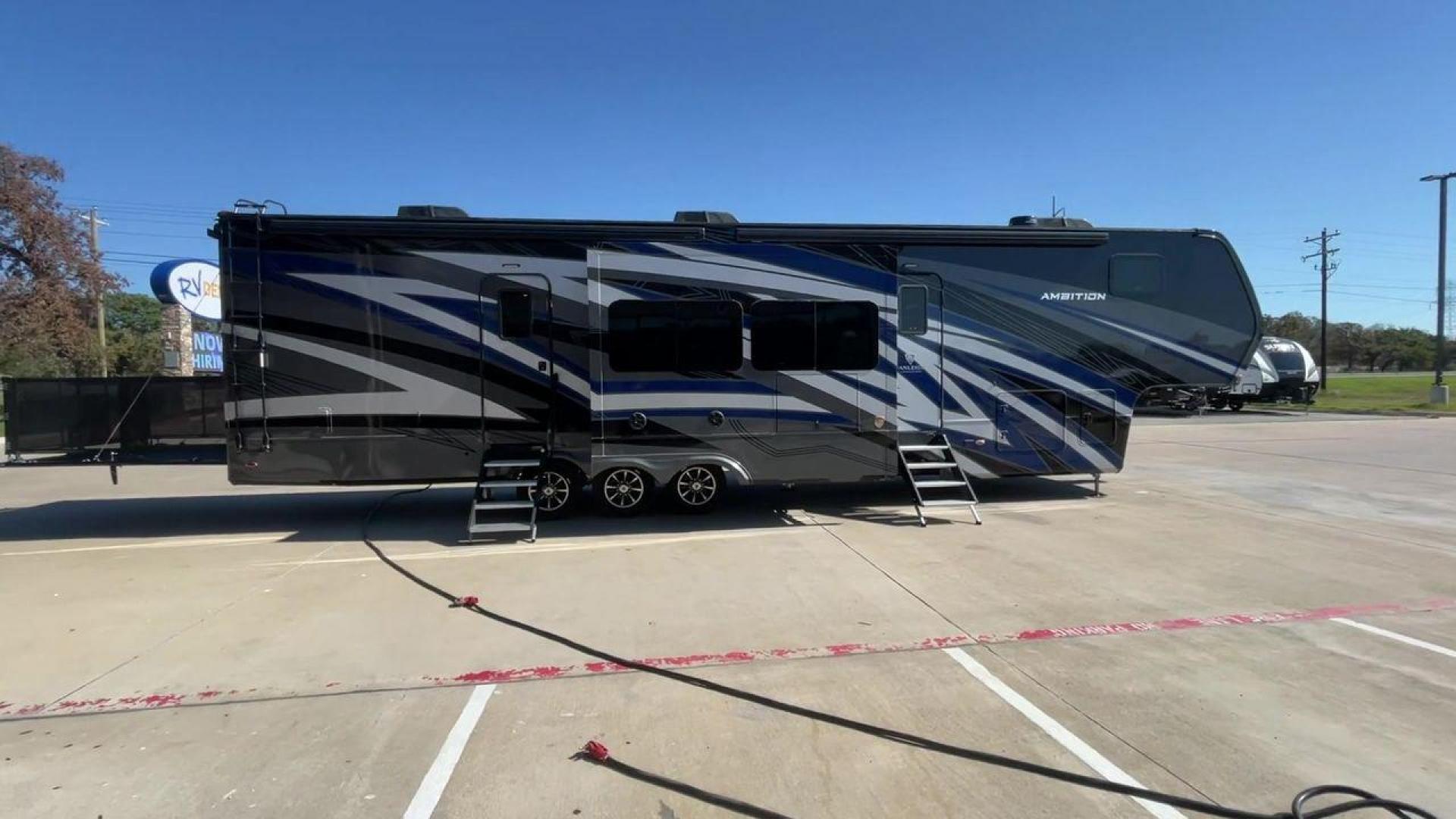 2022 VANLEIGH AMBITION 399TH (7HHAC4333NV) , Length: 43.58 ft. | Dry Weight: 16,900 lbs. | Gross Weight: 21,000 lbs. | Slides: 2 transmission, located at 4319 N Main Street, Cleburne, TX, 76033, (817) 221-0660, 32.435829, -97.384178 - Brace yourself for some wild and thrilling adventures in this 2022 Vanleigh Ambition 399TH! This big and spacious toy hauler measures 43.58 ft. in length and 13.08 ft. in height. It has a dry weight of 16,900 lbs. and a GVWR of 21,000 lbs. It also has a hitch weight of 3,500 lbs. which makes it t - Photo#2