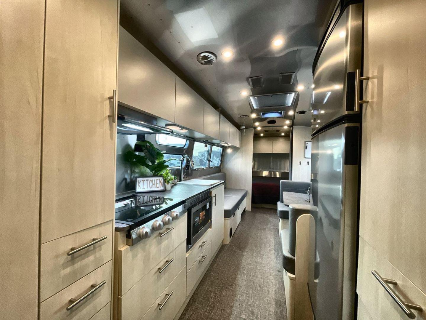 2023 AIRSTREAM FLYING CLOUD 30FB (1STC9YP21PJ) , Length: 30.83 ft | Dry Weight: 6,672 lbs | Gross Weight: 8,800 lbs | Slides: 0 transmission, located at 4319 N Main Street, Cleburne, TX, 76033, (817) 221-0660, 32.435829, -97.384178 - With a length of 30.83 feet, the 2023 Airstream Flying Cloud 30FB provides ample space for a luxurious camping experience. Its dry weight of 6,672 lbs makes it relatively lightweight for towing, while its gross weight capacity of 8,800 lbs ensures you can pack all the essentials for your trip. The i - Photo#12