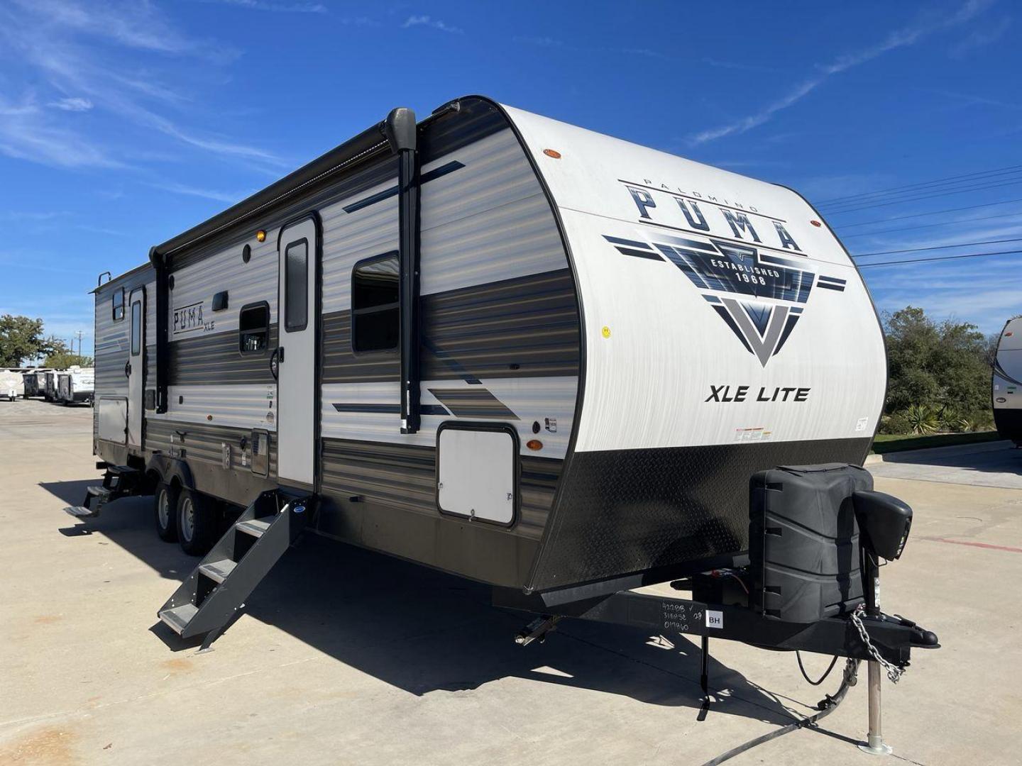 2023 FOREST RIVER PUMA 31BHSC (5ZT2PUWB4P4) , Length: 35.5 ft. | Dry Weight: 7,946 lbs. | Gross Weight: 9,600 lbs. | Slides: 2 transmission, located at 4319 N Main Street, Cleburne, TX, 76033, (817) 221-0660, 32.435829, -97.384178 - The 2023 Palomino Puma 31BHSC stands out with its sleek and modern exterior design. Measuring 35.5 feet in length, this unit is built for comfort and style. Its aluminum siding features a striking two-tone finish. With two large slide-outs, this RV offers expanded living space when parked. The front - Photo#21