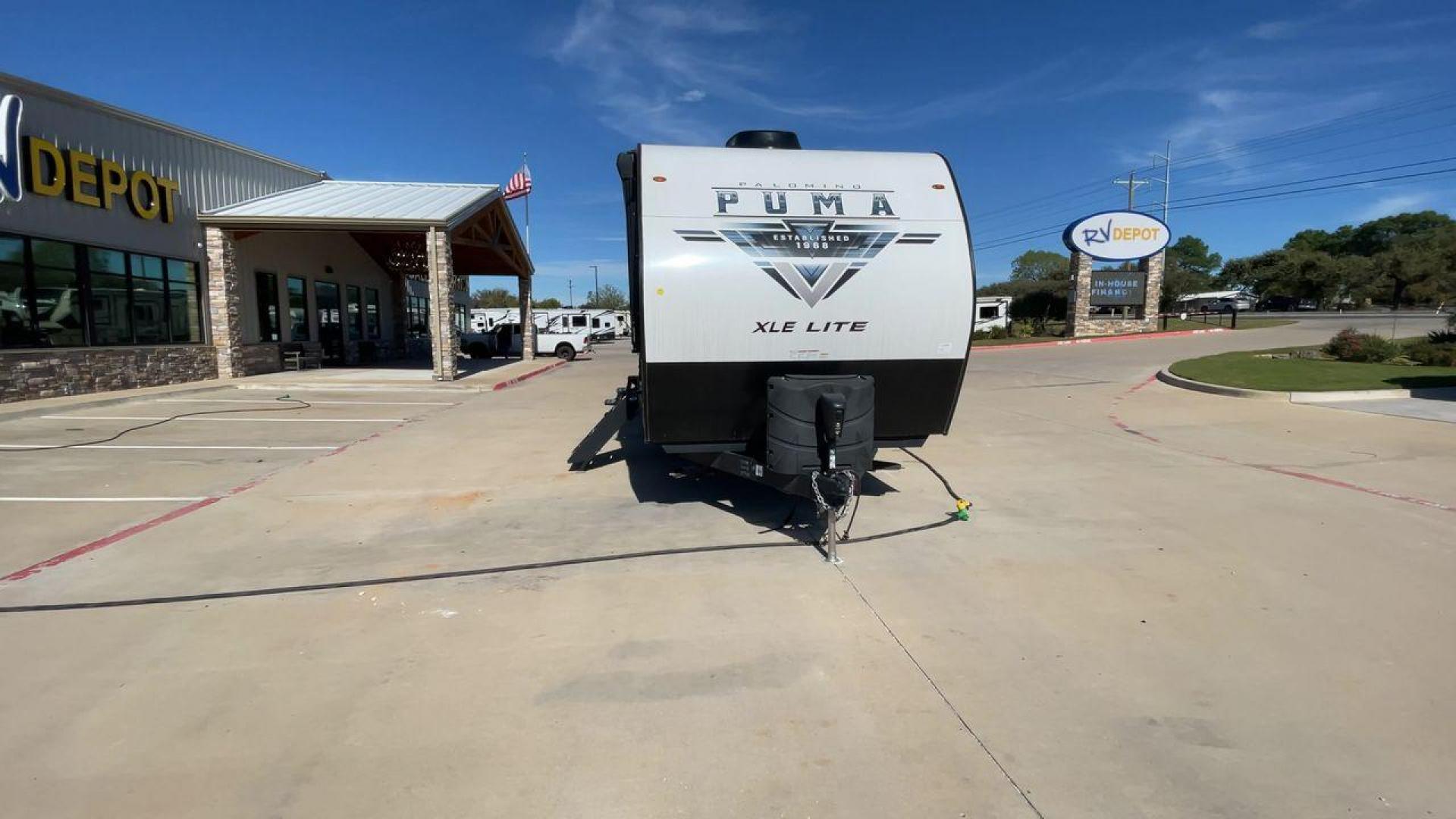 2023 FOREST RIVER PUMA 31BHSC (5ZT2PUWB4P4) , Length: 35.5 ft. | Dry Weight: 7,946 lbs. | Gross Weight: 9,600 lbs. | Slides: 2 transmission, located at 4319 N Main Street, Cleburne, TX, 76033, (817) 221-0660, 32.435829, -97.384178 - The 2023 Palomino Puma 31BHSC stands out with its sleek and modern exterior design. Measuring 35.5 feet in length, this unit is built for comfort and style. Its aluminum siding features a striking two-tone finish. With two large slide-outs, this RV offers expanded living space when parked. The front - Photo#4