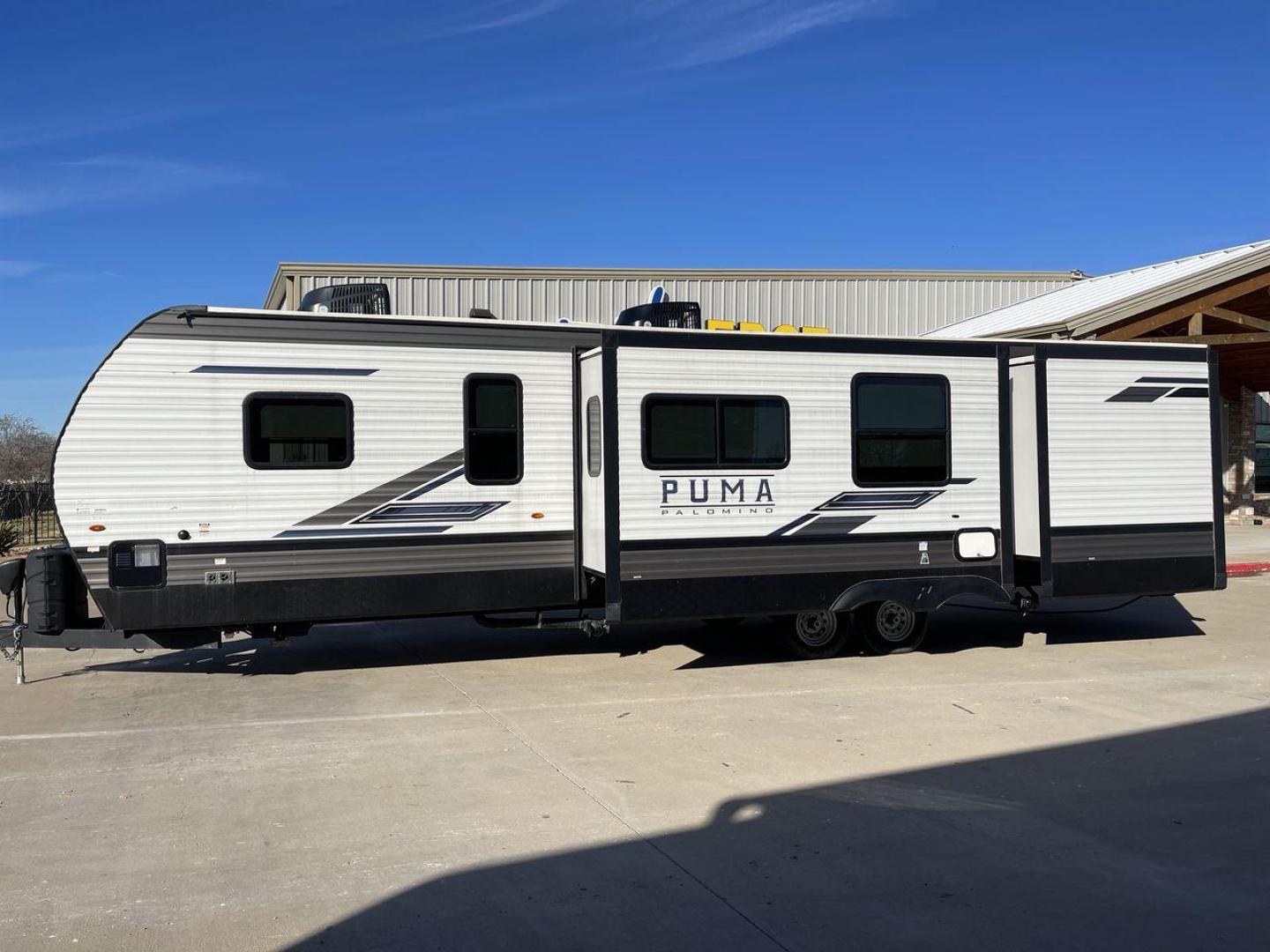 2023 FOREST RIVER PUMA 32BH2B (4X4TPUH21PP) , Length: 38.5 ft. | Dry Weight: 9,023 lbs. | Gross Weight: 11,230 lbs | Slides: 3 transmission, located at 4319 N Main Street, Cleburne, TX, 76033, (817) 221-0660, 32.435829, -97.384178 - With its ample space and adaptability, the 2023 Palomino Puma 32BH2B travel trailer is perfect for hosting extended families and gatherings. This model provides generous living space while maintaining excellent maneuverability on the road. It measures 38.5 feet in length and has a dry weight of 9,02 - Photo#24