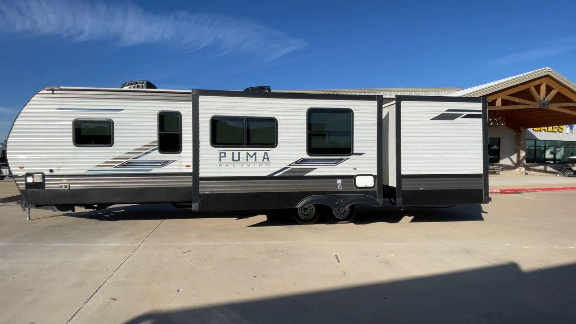 2023 FOREST RIVER PUMA 32BH2B (4X4TPUH21PP) , Length: 38.5 ft. | Dry Weight: 9,023 lbs. | Gross Weight: 11,230 lbs | Slides: 3 transmission, located at 4319 N Main Street, Cleburne, TX, 76033, (817) 221-0660, 32.435829, -97.384178 - With its ample space and adaptability, the 2023 Palomino Puma 32BH2B travel trailer is perfect for hosting extended families and gatherings. This model provides generous living space while maintaining excellent maneuverability on the road. It measures 38.5 feet in length and has a dry weight of 9,02 - Photo#6