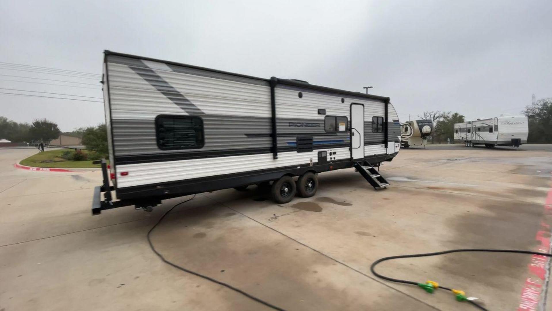 2023 HEARTLAND PIONEER QB300 (5SFPB3524PE) , Length: 35 ft. | Dry Weight: 6,896 lbs. | Gross Weight: 9,000 lbs. | Slides: 1 transmission, located at 4319 N Main Street, Cleburne, TX, 76033, (817) 221-0660, 32.435829, -97.384178 - The 2023 Heartland Pioneer QB300 is a spacious travel trailer, perfect for family adventures. Measuring 35 feet in length, it features a single slideout, which significantly expands the interior space, creating a comfortable living environment. With a dry weight of 6,896 lbs and a gross weight of 9, - Photo#1