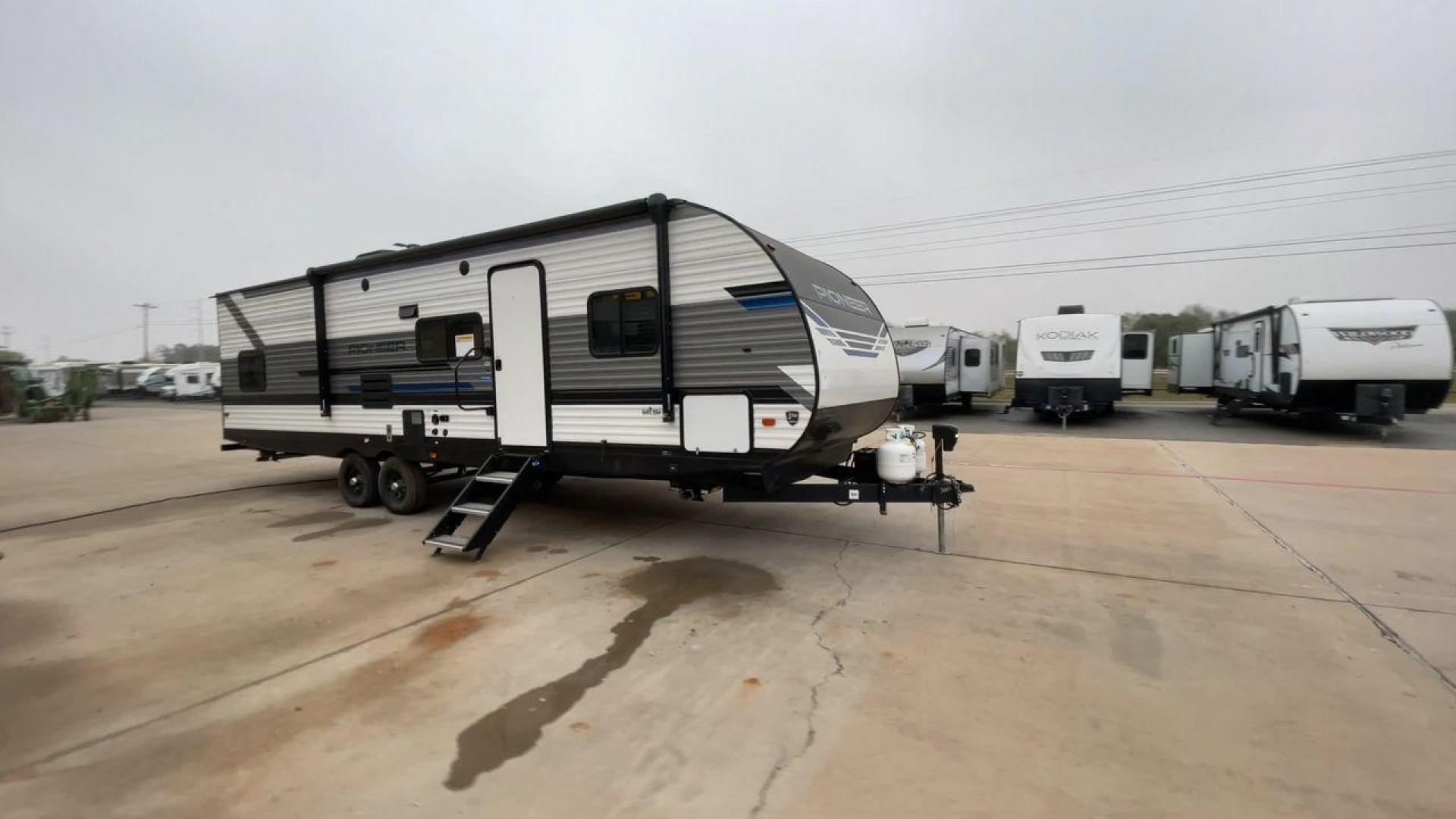 2023 HEARTLAND PIONEER QB300 (5SFPB3524PE) , Length: 35 ft. | Dry Weight: 6,896 lbs. | Gross Weight: 9,000 lbs. | Slides: 1 transmission, located at 4319 N Main Street, Cleburne, TX, 76033, (817) 221-0660, 32.435829, -97.384178 - The 2023 Heartland Pioneer QB300 is a spacious travel trailer, perfect for family adventures. Measuring 35 feet in length, it features a single slideout, which significantly expands the interior space, creating a comfortable living environment. With a dry weight of 6,896 lbs and a gross weight of 9, - Photo#3