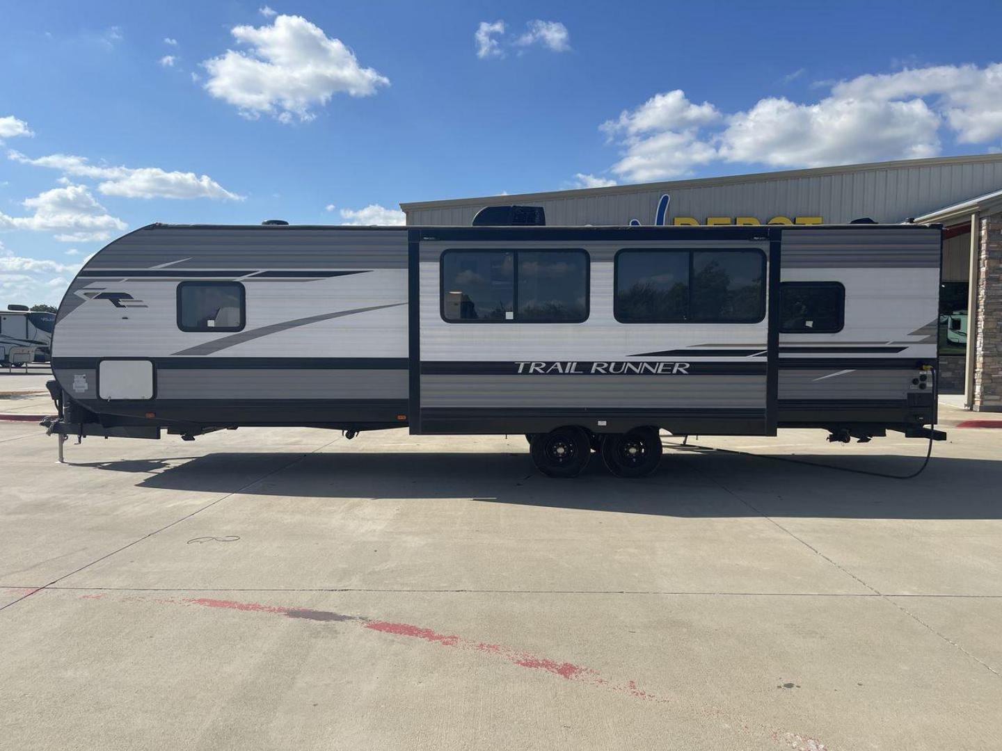 2023 HEARTLAND TRAIL RUNNER 31DB (5SFEB3723PE) , Length: 36.92 ft | Dry Weight: 7,040 lbs | GVWR: 9,642 lbs | Slides: 1 transmission, located at 4319 N Main Street, Cleburne, TX, 76033, (817) 221-0660, 32.435829, -97.384178 - The 2023 Heartland Trail Runner 31DB is a versatile and spacious travel trailer designed for families and adventure enthusiasts. This vehicle is the perfect option for families or groups looking to embark on memorable road trips. The travel trailer is a bunkhouse, and features a family-centric layou - Photo#24