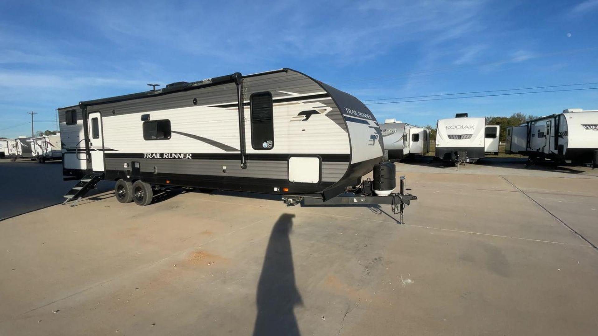 2023 HEARTLAND TRAIL RUNNER 31DB (5SFEB3721PE) , Length: 36.92 ft | Dry Weight: 7,040 lbs | GVWR: 9,642 lbs | Slides: 1 transmission, located at 4319 N Main Street, Cleburne, TX, 76033, (817) 221-0660, 32.435829, -97.384178 - A roomy and family-friendly travel trailer, the 2023 Heartland Trail Runner 31DB ensures a relaxing and delightful camping experience. This model accommodates larger parties and has contemporary conveniences to make your outdoor experiences unforgettable. It also has a well-designed floor plan. This - Photo#3