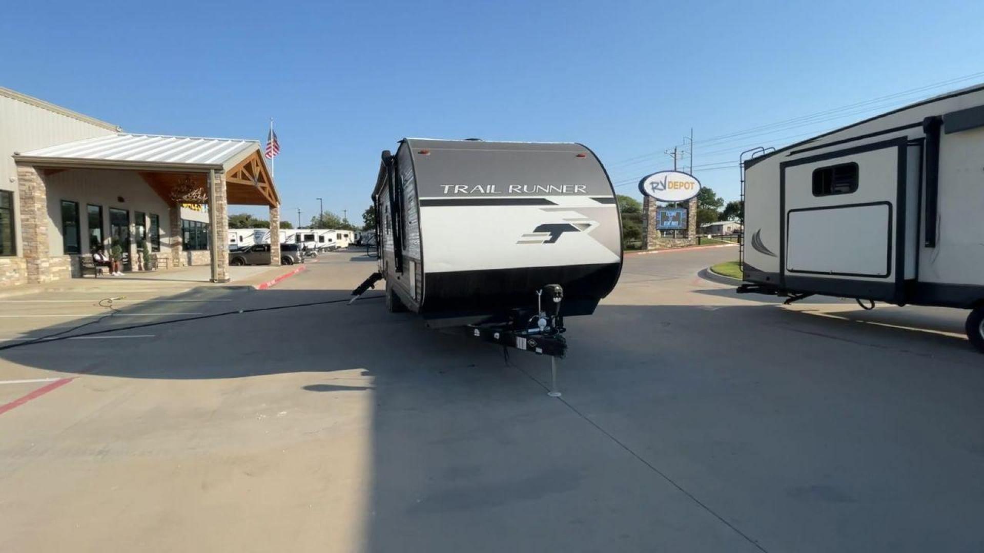 2023 HEARTLAND TRAIL RUNNER 31DB (5SFEB3722PE) , Length: 36.92 ft | Dry Weight: 7,040 lbs | GVWR: 9,642 lbs | Slides: 1 transmission, located at 4319 N Main Street, Cleburne, TX, 76033, (817) 221-0660, 32.435829, -97.384178 - The 2023 Heartland Trail Runner 31DB is a versatile and spacious travel trailer designed for families and adventure enthusiasts. This vehicle is the perfect option for families or groups looking to embark on memorable road trips. The travel trailer is a bunkhouse, and features a family-centric layou - Photo#4