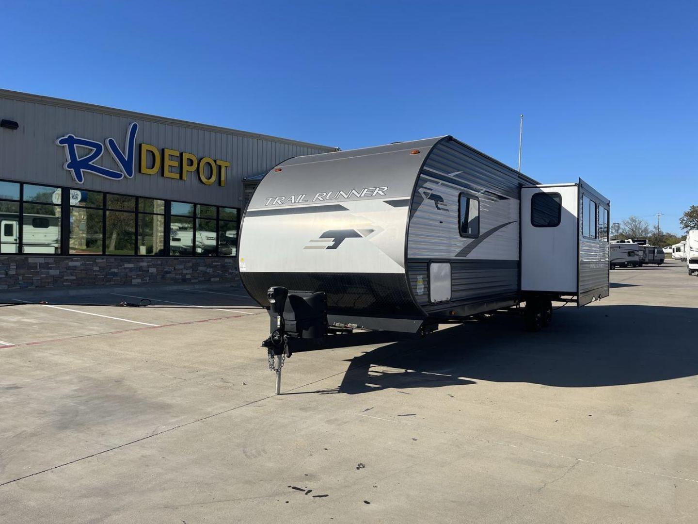 2023 HEARTLAND TRAIL RUNNER 31DB (5SFEB3729PE) , Length: 36.92 ft | Dry Weight: 7,040 lbs | GVWR: 9,642 lbs | Slides: 1 transmission, located at 4319 N Main Street, Cleburne, TX, 76033, (817) 221-0660, 32.435829, -97.384178 - The 2023 Heartland Trail Runner 31DB is a versatile and spacious travel trailer designed for families and adventure enthusiasts. This vehicle is the perfect option for families or groups looking to embark on memorable road trips. The travel trailer is a bunkhouse, and features a family-centric layou - Photo#0