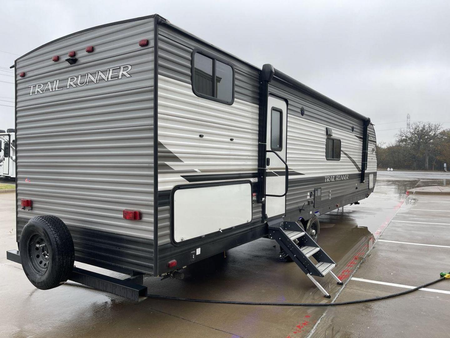 2023 HEARTLAND TRAIL RUNNER 31DB (5SFEB3729PE) , Length: 36.92 ft | Dry Weight: 7,040 lbs | GVWR: 9,642 lbs | Slides: 1 transmission, located at 4319 N Main Street, Cleburne, TX, 76033, (817) 221-0660, 32.435829, -97.384178 - The 2023 Heartland Trail Runner 31DB is a versatile and spacious travel trailer designed for families and adventure enthusiasts. This vehicle is the perfect option for families or groups looking to embark on memorable road trips. The travel trailer is a bunkhouse, and features a family-centric layou - Photo#25