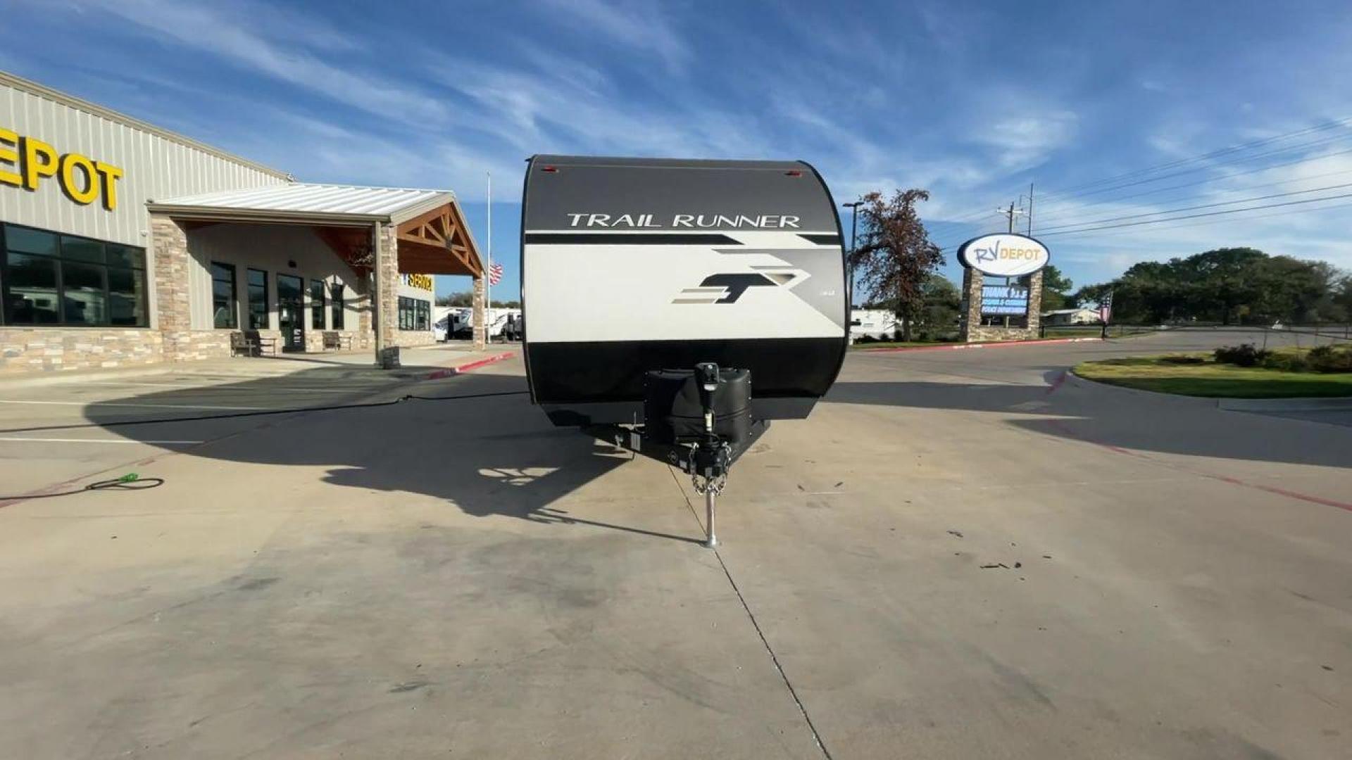 2023 HEARTLAND TRAIL RUNNER 31DB (5SFEB3726PE) , Length: 36.92 ft | Dry Weight: 7,040 lbs | GVWR: 9,642 lbs | Slides: 1 transmission, located at 4319 N Main Street, Cleburne, TX, 76033, (817) 221-0660, 32.435829, -97.384178 - The 2023 Heartland Trail Runner 31DB is a versatile and spacious travel trailer designed for families and adventure enthusiasts. This vehicle is the perfect option for families or groups looking to embark on memorable road trips. The travel trailer is a bunkhouse, and features a family-centric layou - Photo#4