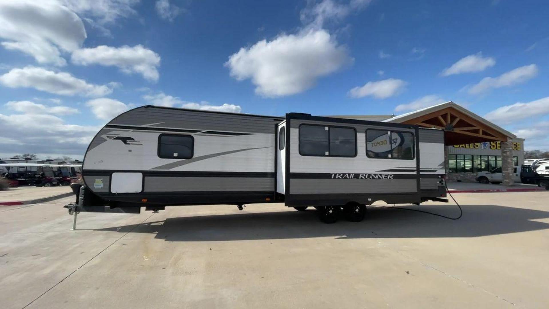 2023 HEARTLAND TRAIL RUNNER 31DB (5SFEB3722PE) , Length: 36.92 ft | Dry Weight: 7,040 lbs. | Gross Weight: 9,642 lbs | Slides: 1 transmission, located at 4319 N Main Street, Cleburne, TX, 76033, (817) 221-0660, 32.435829, -97.384178 - The 2023 Heartland Trail Runner 31DB is a family-friendly travel trailer designed to elevate your camping adventures with comfort and convenience. Measuring 36 feet, this model is a testament to Heartland's commitment to providing a spacious and well-equipped living space. The 31DB boasts a smart la - Photo#6