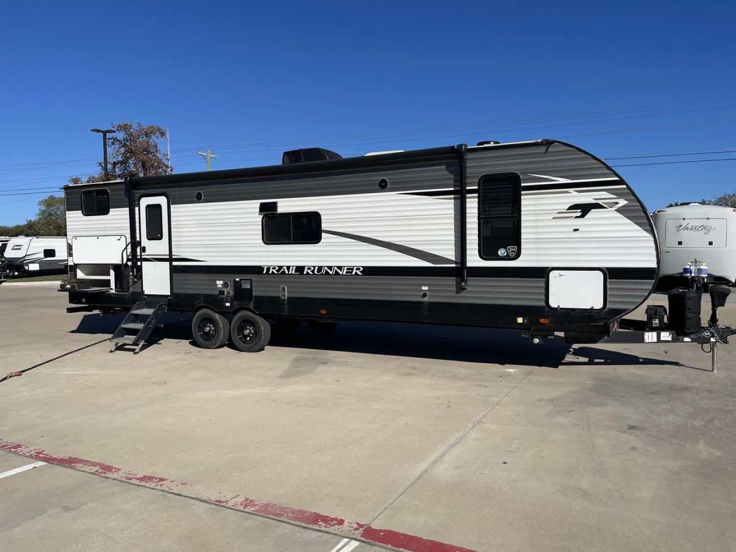 2023 HEARTLAND TRAIL RUNNER 31DB (5SFEB3720PE) , Length: 36.92 ft. | Dry Weight: 7,040 lbs. | Gross Weight: 9,642 lbs. | Slides: 1 transmission, located at 4319 N Main Street, Cleburne, TX, 76033, (817) 221-0660, 32.435829, -97.384178 - The 2023 Heartland Trail Runner 31DB is a versatile and spacious travel trailer designed for families and adventure enthusiasts. This vehicle is the perfect option for families or groups looking to embark on memorable road trips. The travel trailer is a bunkhouse, and features a family-centric layou - Photo#25