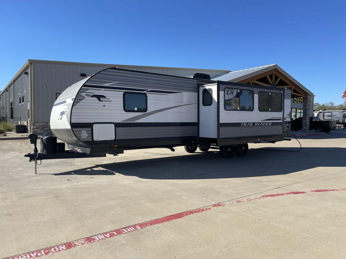 2023 HEARTLAND TRAIL RUNNER 31DB (5SFEB3720PE) , Length: 36.92 ft. | Dry Weight: 7,040 lbs. | Gross Weight: 9,642 lbs. | Slides: 1 transmission, located at 4319 N Main Street, Cleburne, TX, 76033, (817) 221-0660, 32.435829, -97.384178 - The 2023 Heartland Trail Runner 31DB is a versatile and spacious travel trailer designed for families and adventure enthusiasts. This vehicle is the perfect option for families or groups looking to embark on memorable road trips. The travel trailer is a bunkhouse, and features a family-centric layou - Photo#26