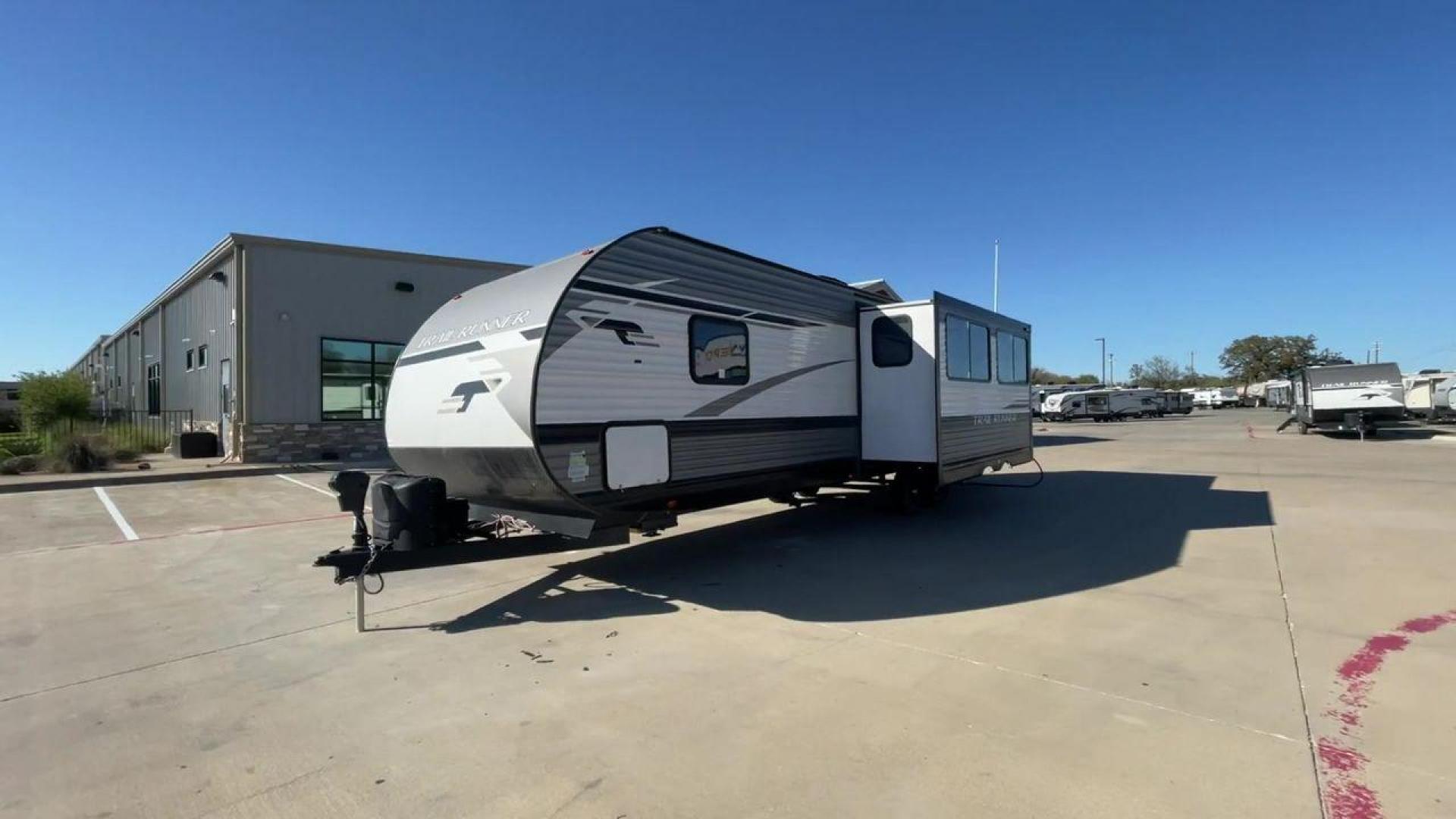 2023 HEARTLAND TRAIL RUNNER 31DB (5SFEB3720PE) , Length: 36.92 ft. | Dry Weight: 7,040 lbs. | Gross Weight: 9,642 lbs. | Slides: 1 transmission, located at 4319 N Main Street, Cleburne, TX, 76033, (817) 221-0660, 32.435829, -97.384178 - The 2023 Heartland Trail Runner 31DB is a versatile and spacious travel trailer designed for families and adventure enthusiasts. This vehicle is the perfect option for families or groups looking to embark on memorable road trips. The travel trailer is a bunkhouse, and features a family-centric layou - Photo#5