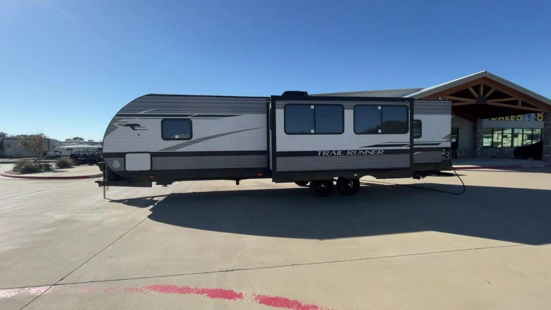 2023 HEARTLAND TRAIL RUNNER 31DB (5SFEB3720PE) , Length: 36.92 ft. | Dry Weight: 7,040 lbs. | Gross Weight: 9,642 lbs. | Slides: 1 transmission, located at 4319 N Main Street, Cleburne, TX, 76033, (817) 221-0660, 32.435829, -97.384178 - The 2023 Heartland Trail Runner 31DB is a versatile and spacious travel trailer designed for families and adventure enthusiasts. This vehicle is the perfect option for families or groups looking to embark on memorable road trips. The travel trailer is a bunkhouse, and features a family-centric layou - Photo#6