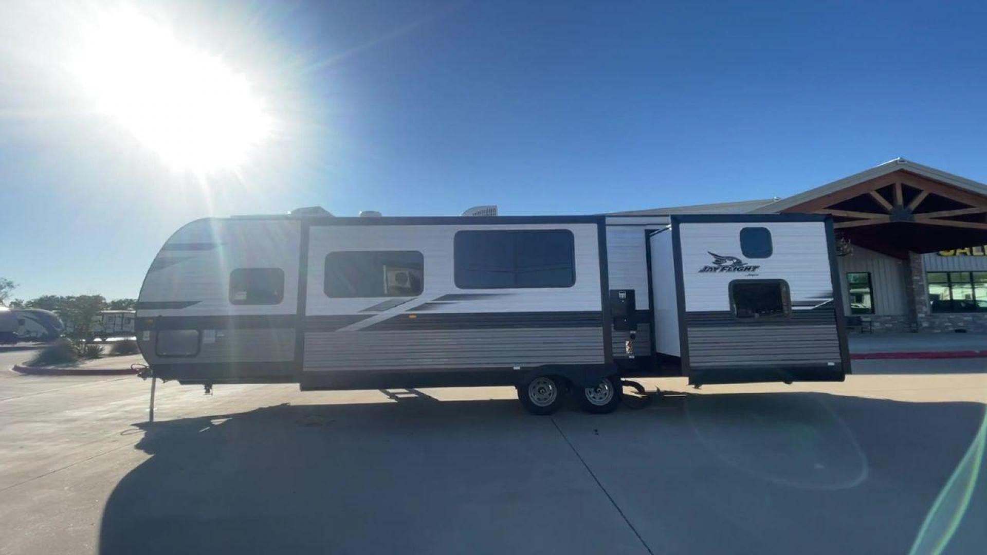 2023 JAYCO JAYFLIGHT 324BDS (1UJBC0BT8P1) , Length: 36.33 ft.| Dry Weight: 7,665 lbs. | Gross Weight: 9,000 lbs.| Slides: 2 transmission, located at 4319 N Main Street, Cleburne, TX, 76033, (817) 221-0660, 32.435829, -97.384178 - The 2023 Jay Flight 324BDS isn't just a travel trailer; it's your adventure-ready home on wheels. Meticulously crafted by Jayco, renowned for their dedication to quality and innovation, this rig caters to families and explorers alike, offering spacious comfort and thoughtful features for an unforget - Photo#6