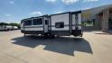 2023 KEYSTONE HIDEOUT 31BRD (4YDTH1R25P7) , Length: 35.92 ft. | Dry Weight: 7,860 lbs. | Slides: 2 transmission, located at 4319 N Main Street, Cleburne, TX, 76033, (817) 221-0660, 32.435829, -97.384178 - The 2023 Keystone Hideout 31BRD is a spacious, family-friendly travel trailer designed to offer comfort and convenience on the road. With a length of 35.92 feet and a dry weight of 7,860 lbs, this model includes two slides that significantly expand the interior space. The exterior features a clean, - Photo#7