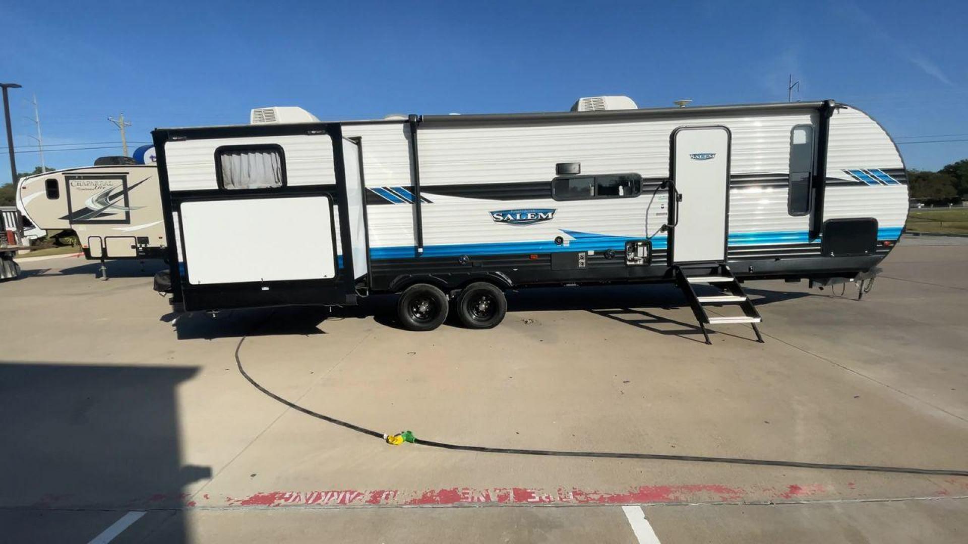 2023 KEYSTONE SALEM 31KQBTS (4X4TSMG22P8) , Length: 36.58 ft. | Dry Weight: 8,573 lbs. | Gross Weight: 9,865 lbs. | Slides: 3 transmission, located at 4319 N Main Street, Cleburne, TX, 76033, (817) 221-0660, 32.435829, -97.384178 - The 2023 Forest River Salem 31KQBTS is a family-focused travel trailer known for its spacious bunkhouse, open living area, and outdoor kitchen. This model is ideal for families or groups who need plenty of sleeping space and storage for extended trips or seasonal stays. The dimensions of this unit a - Photo#2