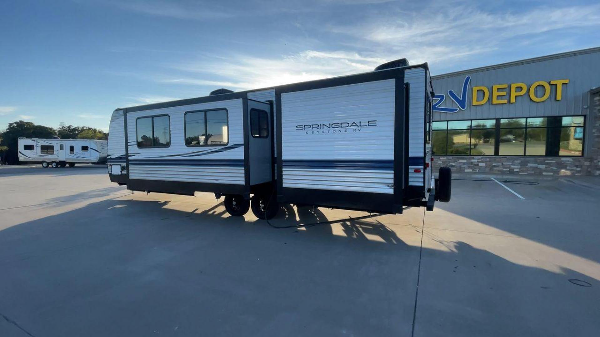 2023 KEYSTONE SPRINGDALE 303BH (4YDTSGP27P3) , Length: 35.08 ft. | Dry Weight: 7,973 lbs. | Gross Weight: 9,770 lbs. | Slides: 2 transmission, located at 4319 N Main Street, Cleburne, TX, 76033, (817) 221-0660, 32.435829, -97.384178 - The 2023 Keystone Springdale 303BH presents a spacious and well-designed exterior. It is 35.08 feet in length, with a dry weight of 7,973 lbs and a gross weight of 9,770 lbs. The RV's dual slides enhance the available space, providing extra room for comfort during extended stays. The Springdale's ex - Photo#7