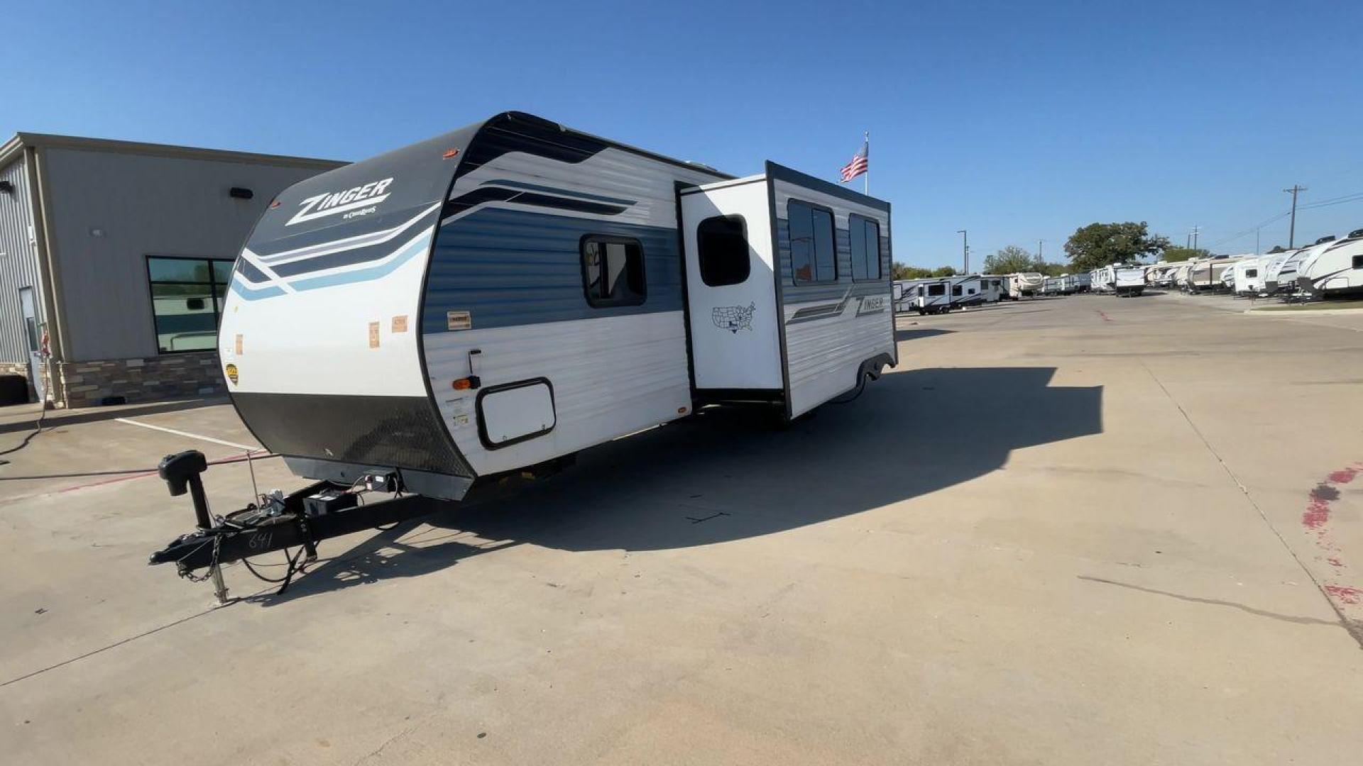 2023 KEYSTONE ZINGER 290KB (4YDTZRN24PS) , Length: 33.5 ft. | Dry Weight: 6,779 lbs. | Gross Weight: 9,670 lbs. | Slides: 1 transmission, located at 4319 N Main Street, Cleburne, TX, 76033, (817) 221-0660, 32.435829, -97.384178 - The 2023 Keystone Zinger 290KB is a family-focused travel trailer with a spacious floor plan, including a dedicated bunkhouse, open living area, and an outdoor kitchen. This model is ideal for families or groups seeking a travel trailer with versatile sleeping arrangements and modern amenities. The - Photo#5