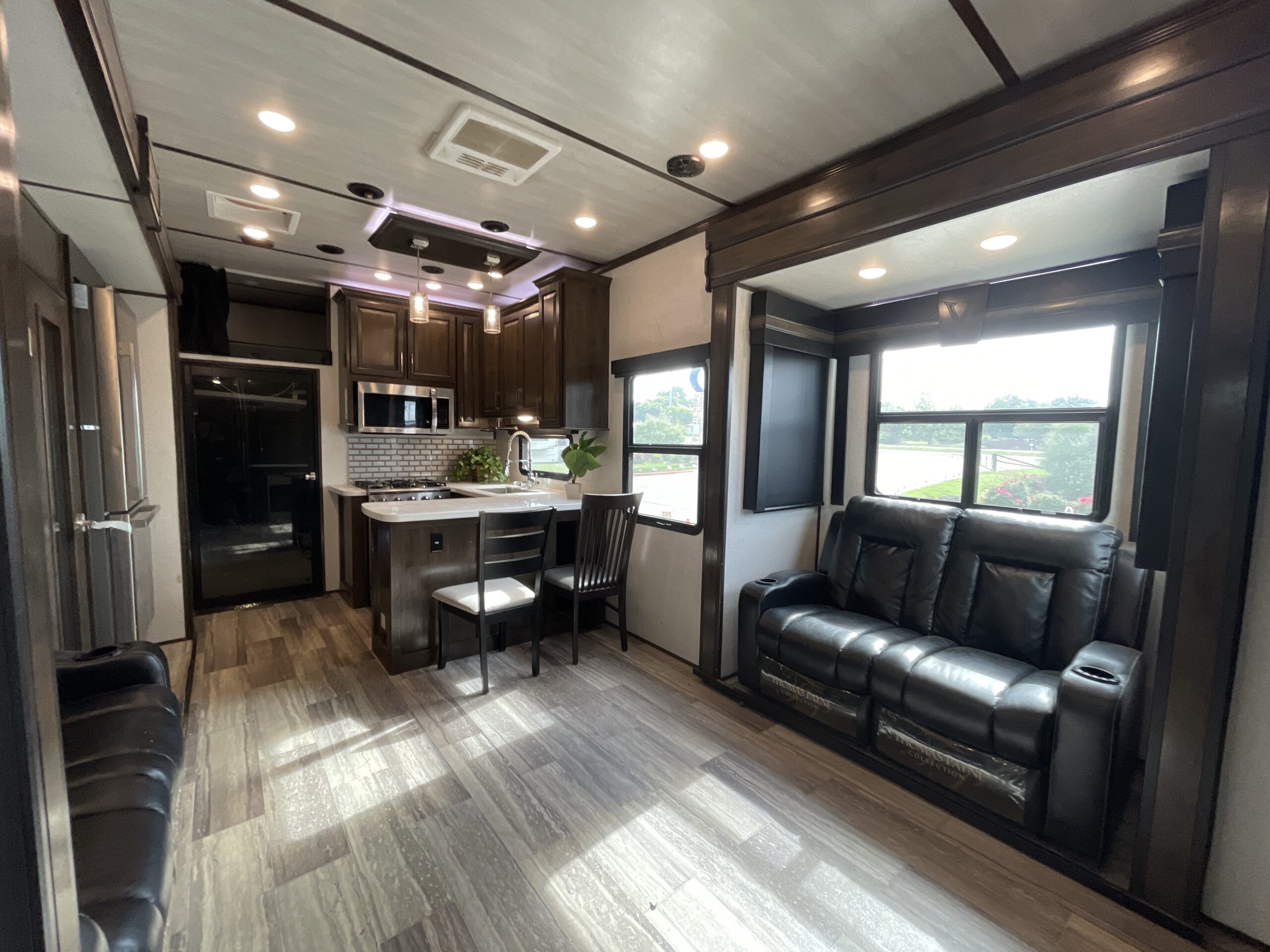 2021 KEYSTONE VOLTAGE 4225 living room of a toy hauler rv