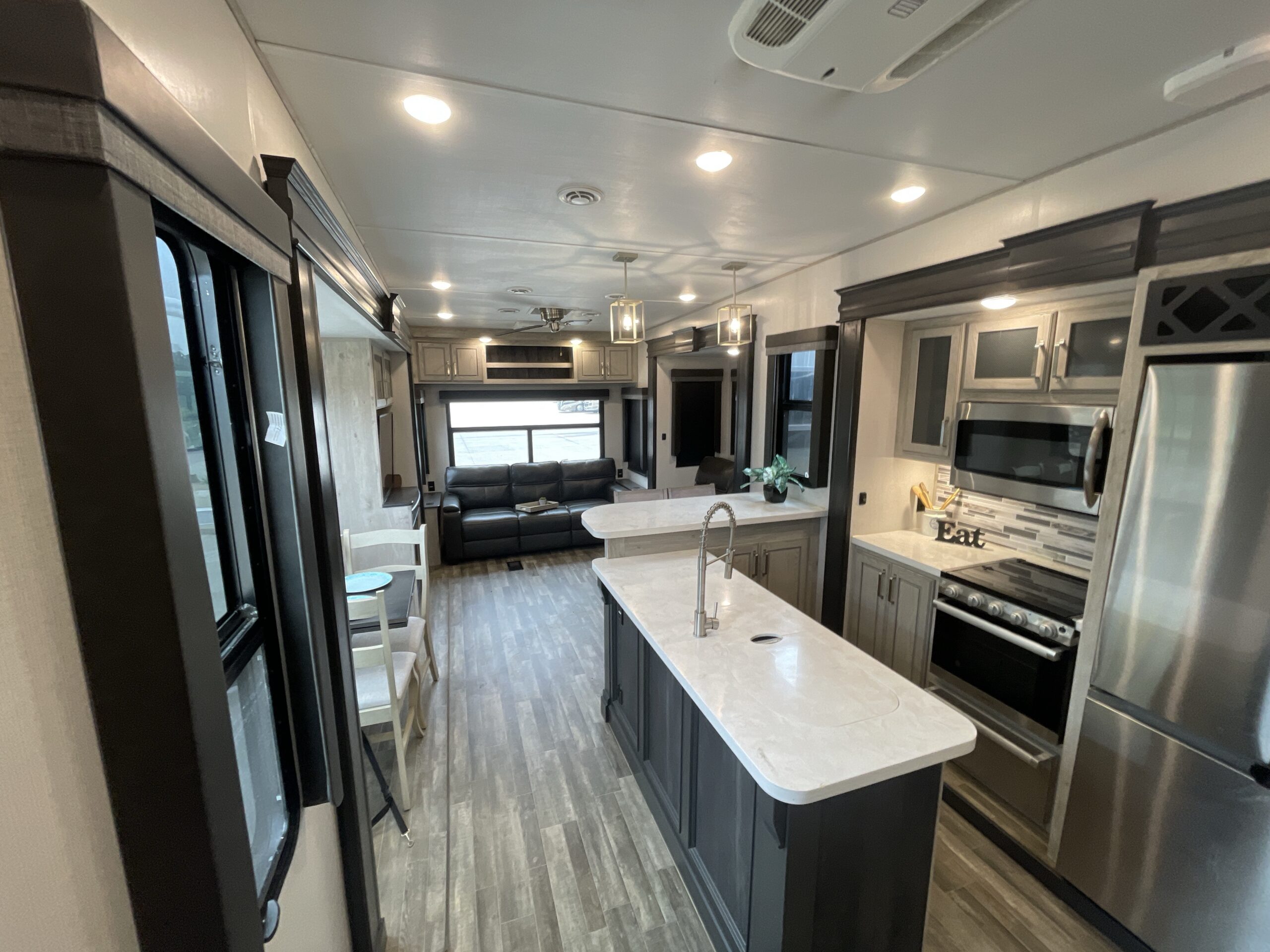 RV Depot - 2022 KEYSTONE AVALANCHE 338GK L Shaped Kitchen Island scaled L shaped kitchen island in a Keystone Avalanche fifth wheel